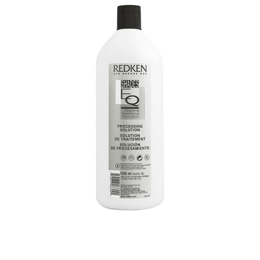 Weiße Flasche mit schwarzem Deckel. Aufschrift: Redken Shades EQ. Etikett mit Produktinformationen.