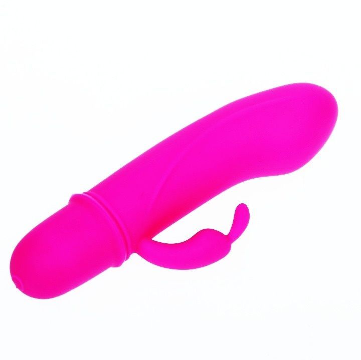 Pinkfarbener Vibrator mit gebogener Form und einer zusätzlichen Ausbuchtung. Auf weißem Hintergrund.
