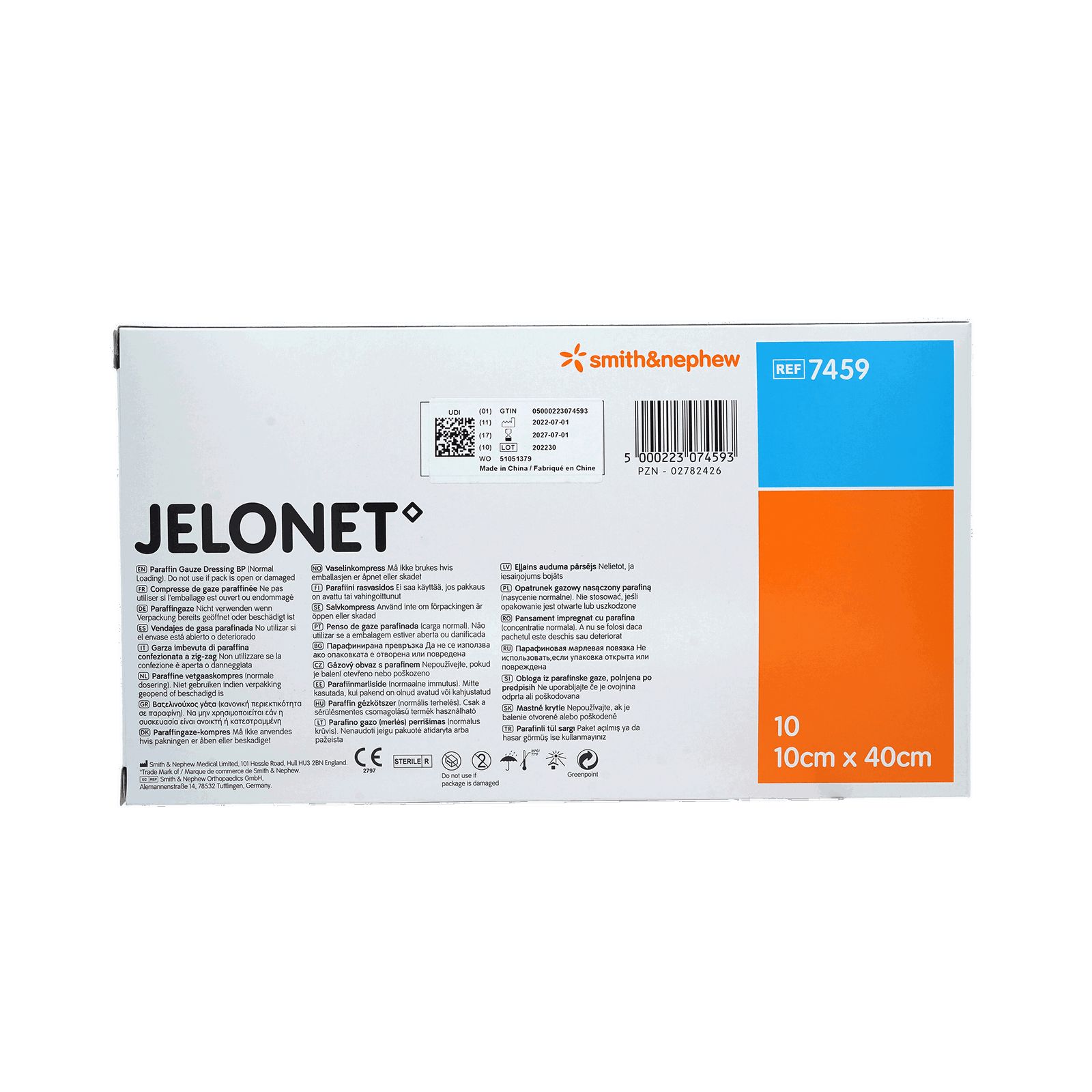 Verpackung von JELONET Paraffingaze. Produktinformationen und Logo. 10x40 cm. Smith & Nephew Logo. Blaue und orangefarbene Akzente.