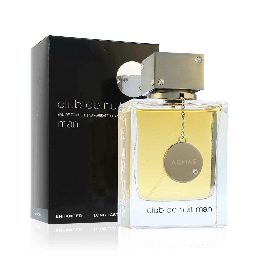 Club de Nuit Man Flakon und Verpackung. Schwarze Verpackung mit weißem Kreis. Flakon mit silberner Kappe und Anhänger.