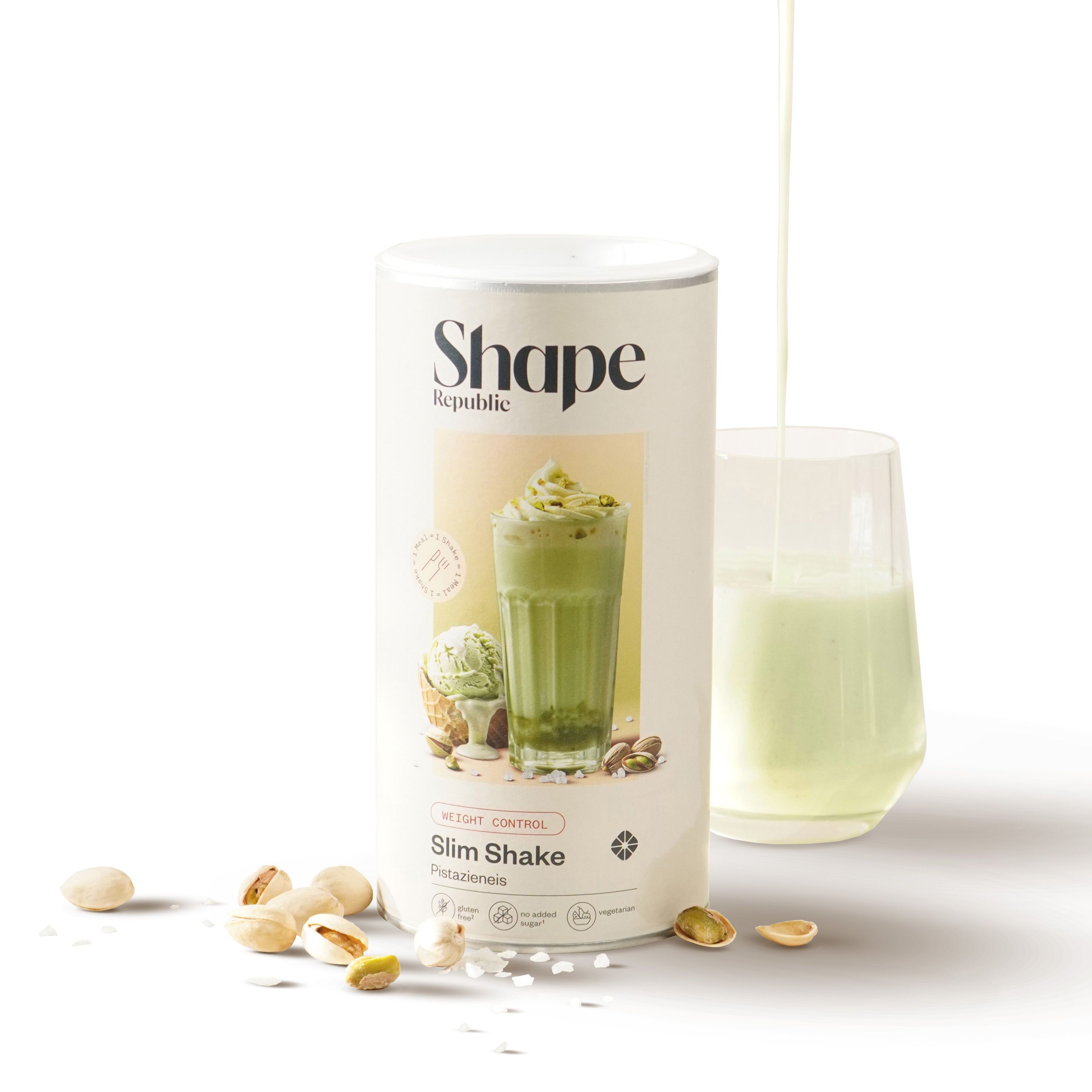 Shape Republic Slim Shake Pistazieneis: Dose, Glas mit grünem Shake, Eis und Pistazien.