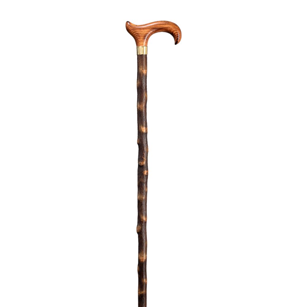 Gehstock mit Derby-Griff aus Holz. Dunkelbrauner Schaft mit helleren Akzenten. Messingring am Griffansatz.