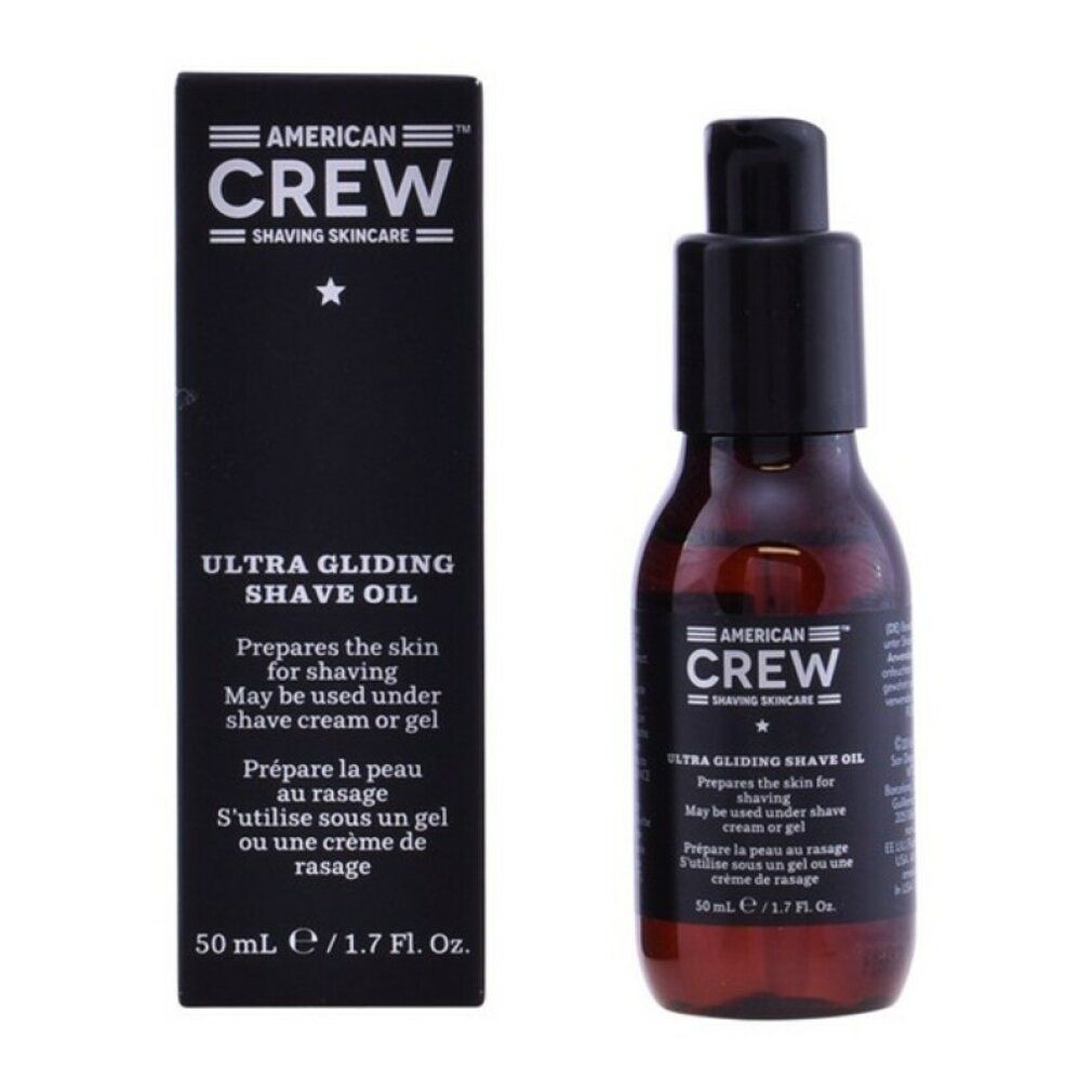 Braune Flasche mit schwarzem Pumpkopf und Karton. Aufschrift: Ultra Gliding Shave Oil. 50 ml.