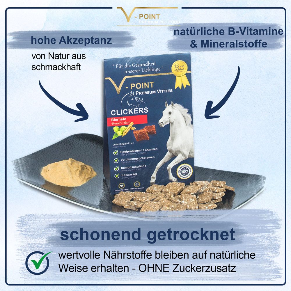 V-POINT® Premium Vitties - CLICKERS Verpackung und Würfel auf einem Tablett. Text: Schonend getrocknet, ohne Zuckerzusatz.