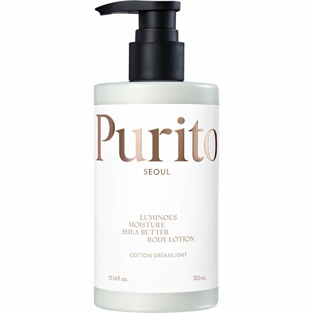 Weiße Flasche mit schwarzem Pumpverschluss. Aufschrift: Purito Seoul, Luminous Moisture Shea Butter Body Lotion, Cotton Dreamlight.