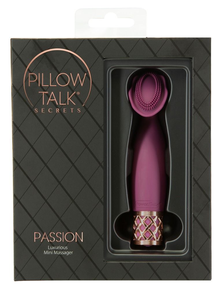 Verpackung mit lila Mini-Vibrator. Schwarze Schachtel mit Produktnamen und Logo. Goldfarbene Details.