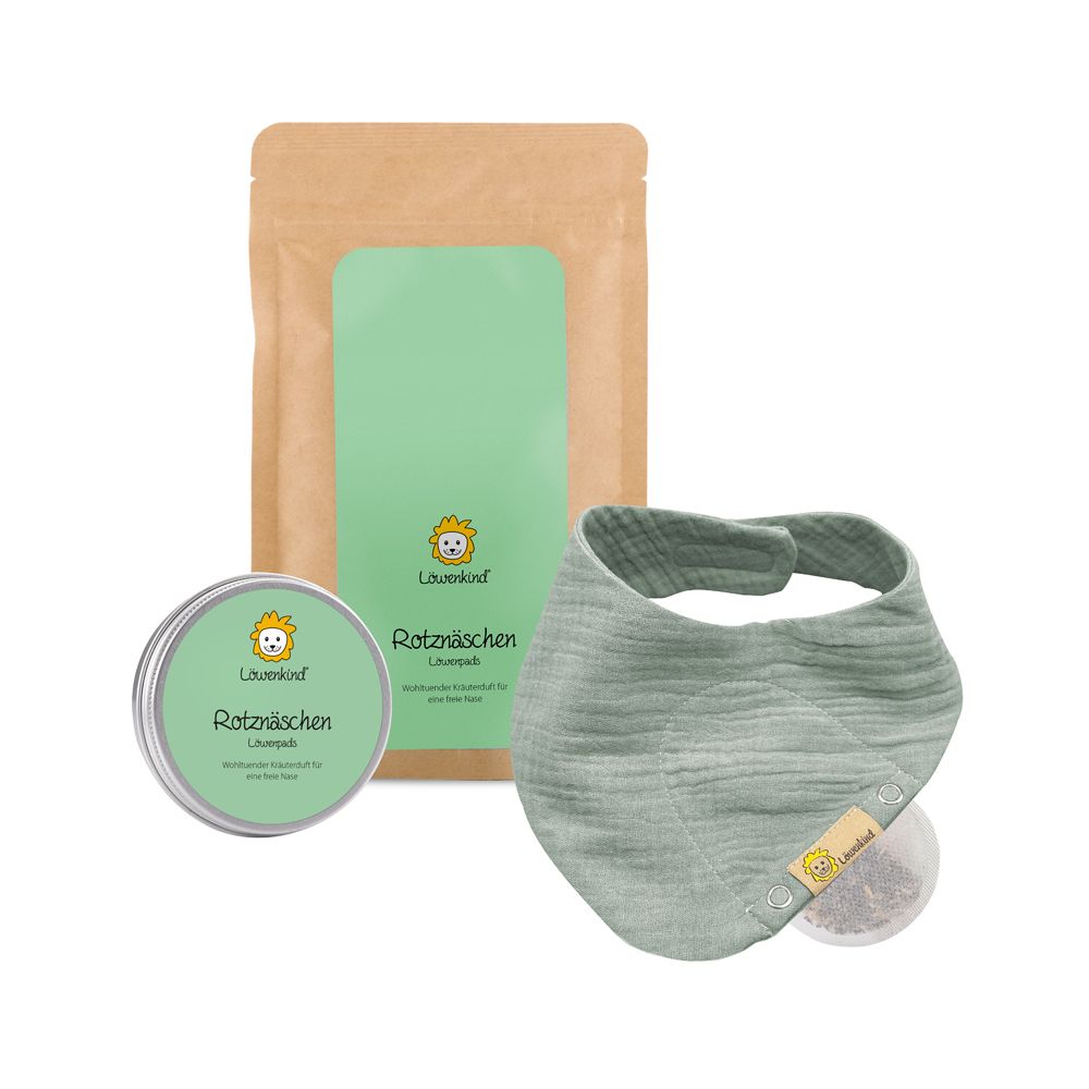 Produkt-Set: Dose, Halstuch, Kräuterpad, Papierverpackung. Alle Produkte in Grün- und Naturtönen.