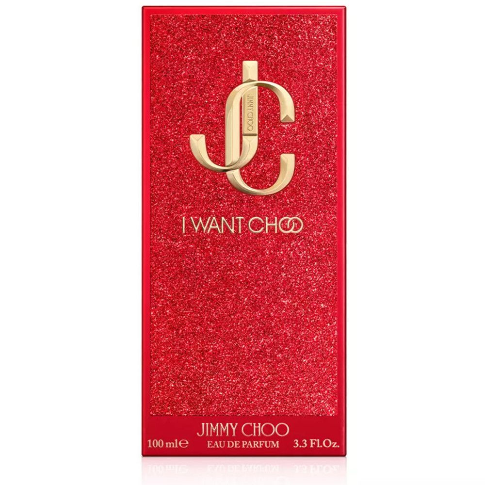 Rote rechteckige Schachtel mit goldenem Logo und Schriftzug "I WANT CHOO". Unten steht "JIMMY CHOO Eau de Parfum".