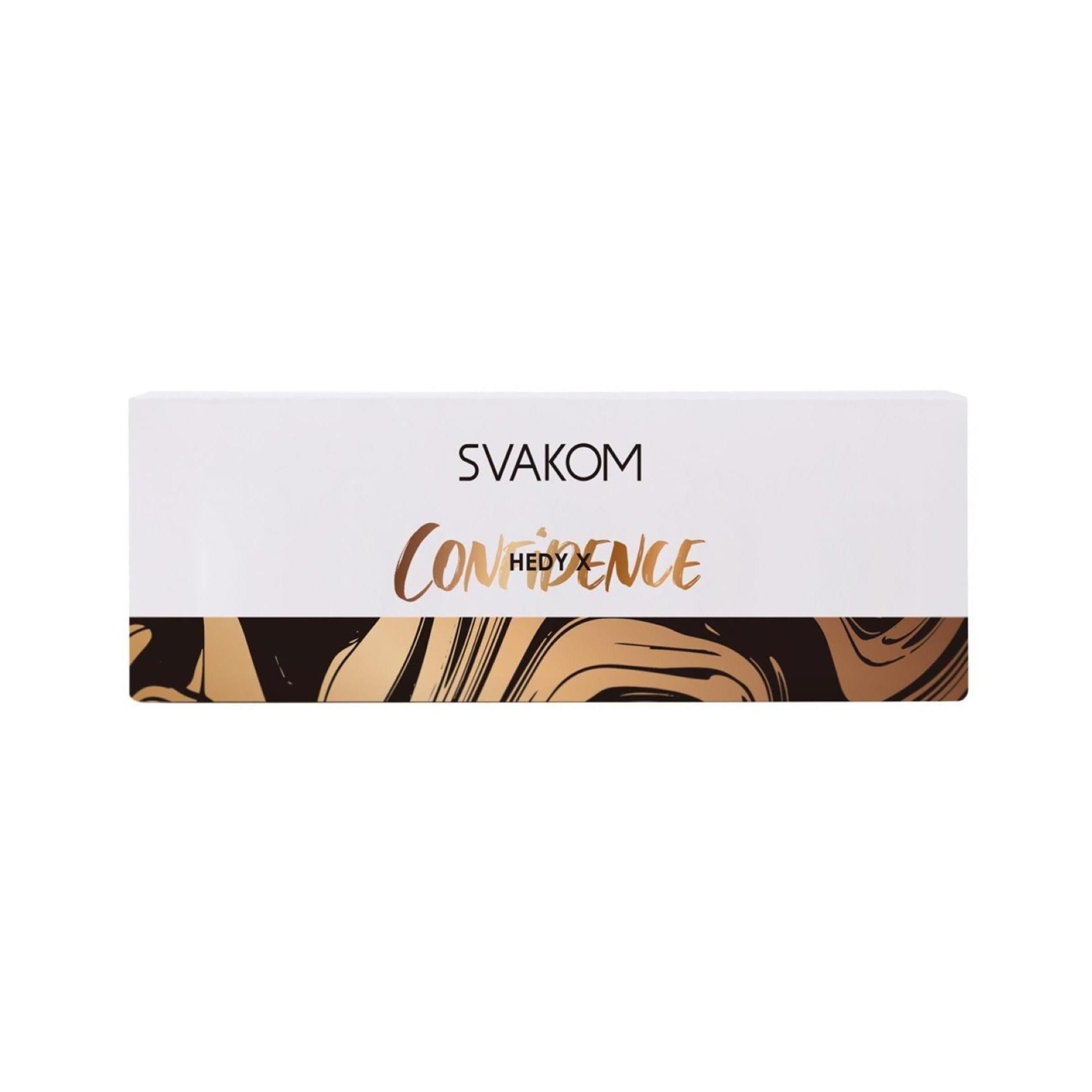 Weißes Produkt mit dem Namen Svakom Speed. Der untere Teil zeigt ein marmoriertes Design in Rosa, Orange und Grau.