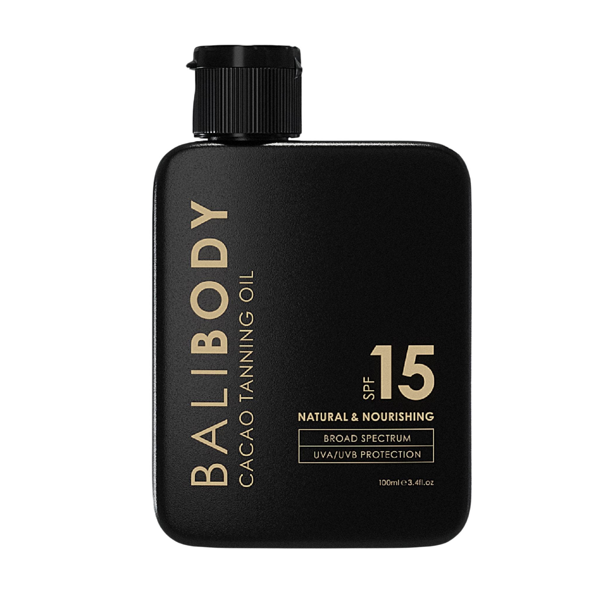 Schwarze Flasche mit goldfarbenem Text: BALIBODY, CACAO TANNING OIL, SPF 15. Enthält UVA/UVB-Schutz. Quadratische Form mit schwarzem Deckel.