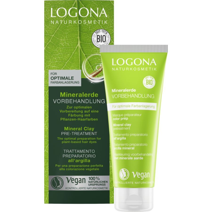 Grüne Tube und Schachtel mit Produktnamen und Logo. Text: Mineralerde Vorbehandlung, Bio, Vegan. Für optimale Farbanlagerung.