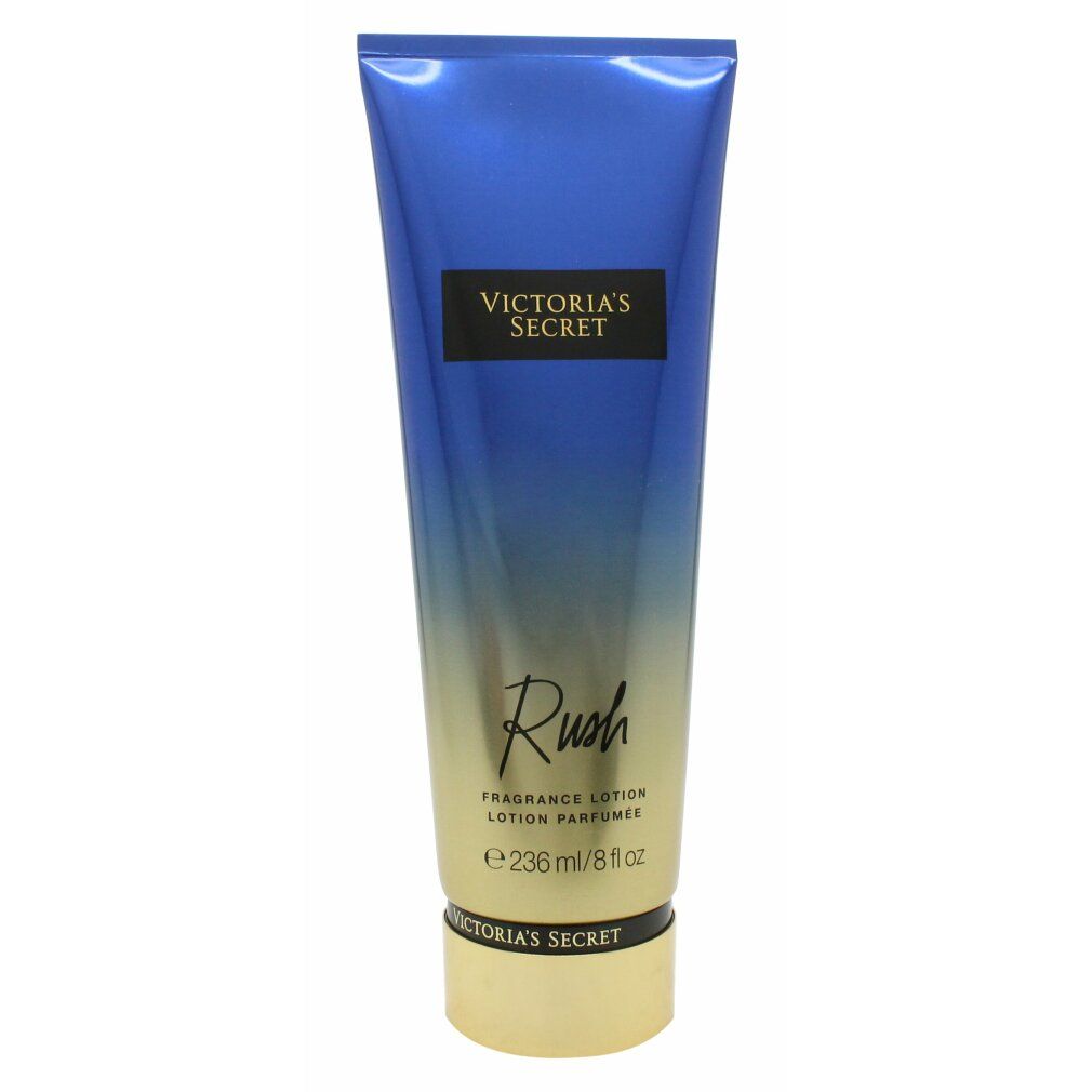 Blau-gelbe Tube. Schwarzes Rechteck mit "VICTORIA'S SECRET". Darunter "Rush" und "Fragrance Lotion". Untere Hälfte goldfarben.