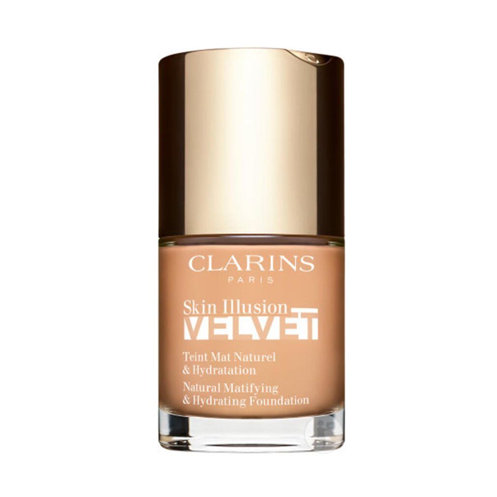 Clarins Skin Illusion Velvet Foundation. Flasche mit goldfarbenem Deckel. Aufschrift: Skin Illusion Velvet, Teint Mat Naturel & Hydratation.