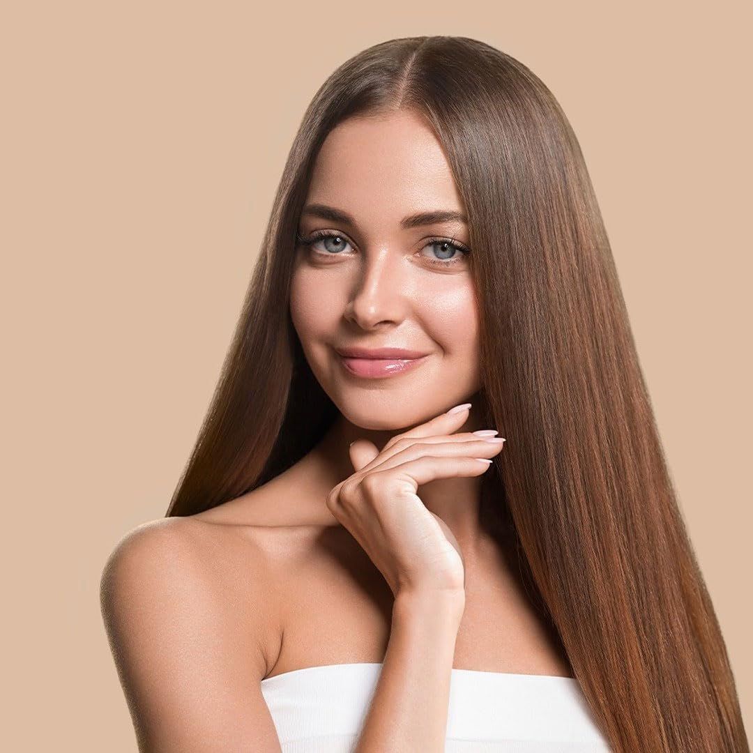 Frau mit langen, glänzenden Haaren.