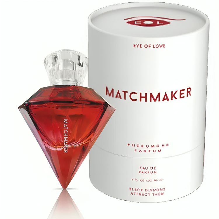 Roter Diamant-Parfümflakon und zylindrische Verpackung. Aufschrift: MATCHMAKER, EYE OF LOVE, Pheromon Parfum.
