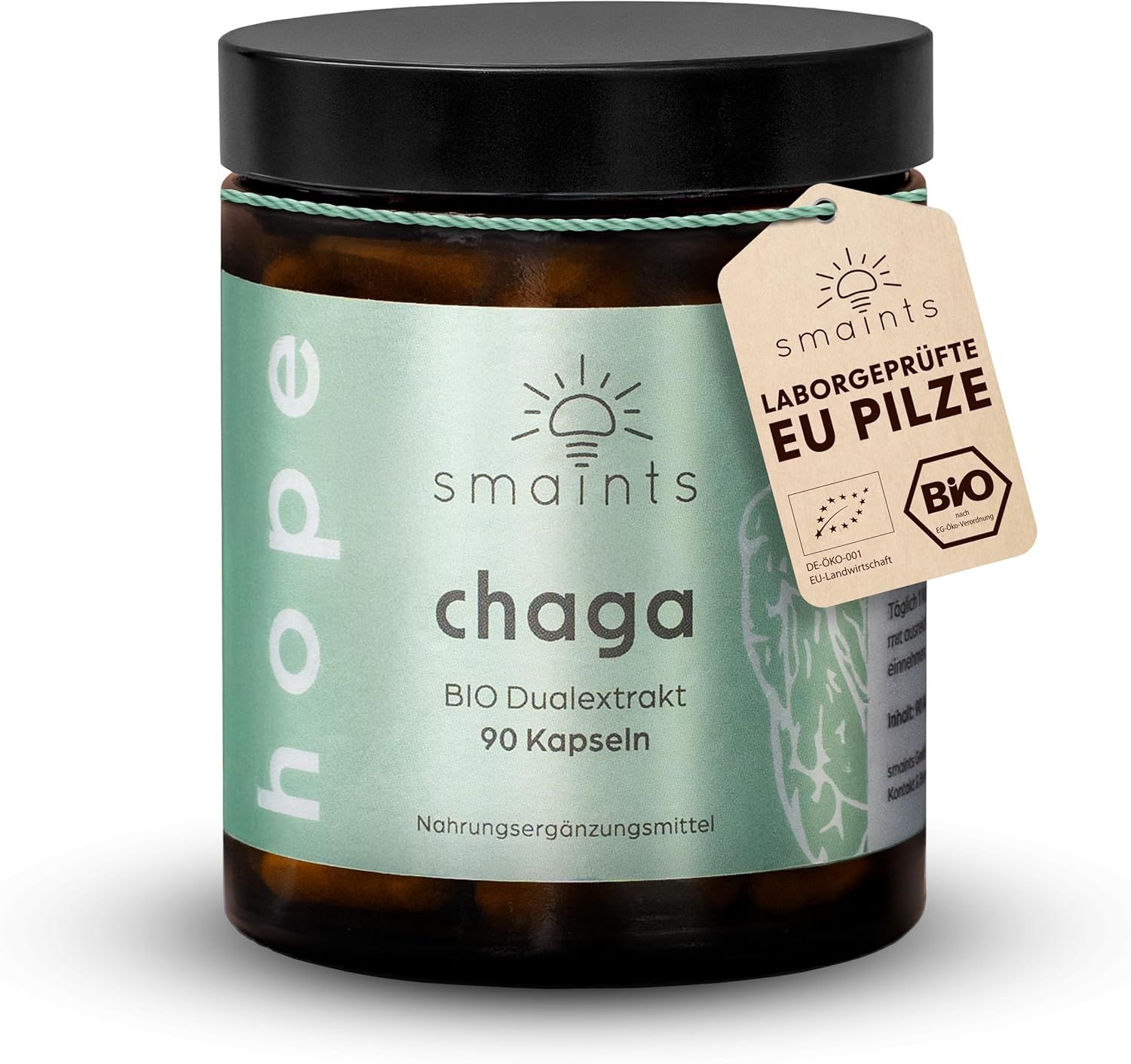 Braune Glasdose mit schwarzem Deckel. Etikett mit Produktinformationen und BIO-Siegel. Anhänger mit EU-Pilze-Zertifizierung.