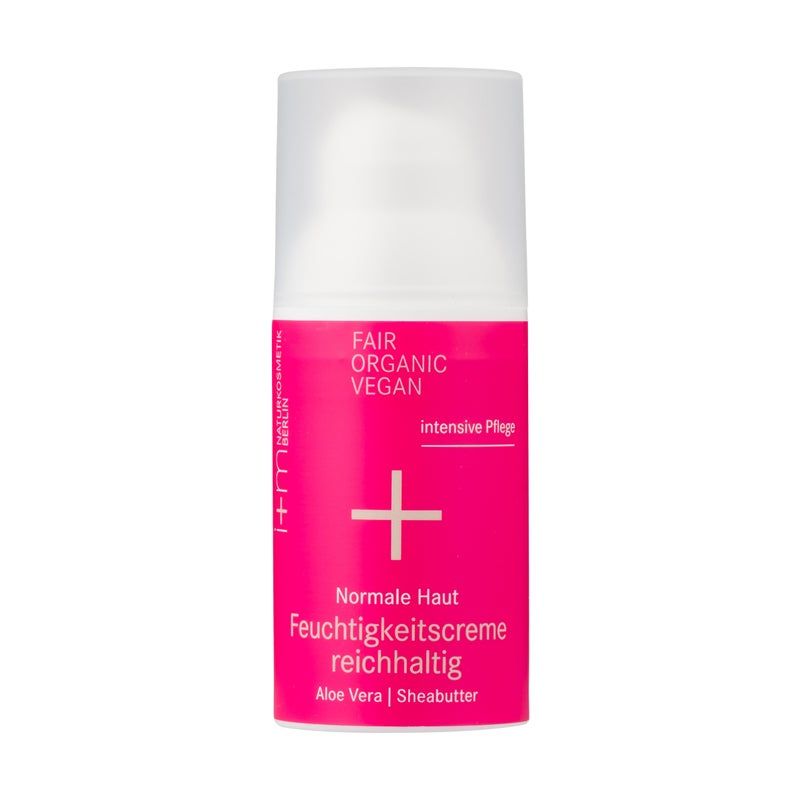 Creme-Spender mit pinkfarbenem Etikett. Text: Fair Organic Vegan, intensive Pflege, Normale Haut Feuchtigkeitscreme reichhaltig, Aloe Vera | Sheabutter.