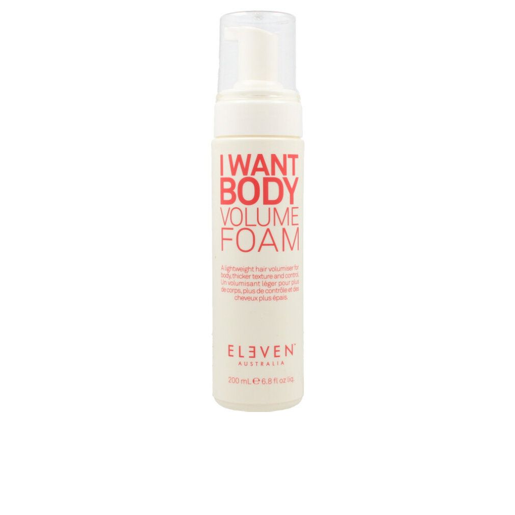 Beige Flasche mit roter Schrift: I WANT BODY VOLUME FOAM. Marke: ELEVEN AUSTRALIA. Mit Pumpverschluss. Text in Englisch und Französisch.