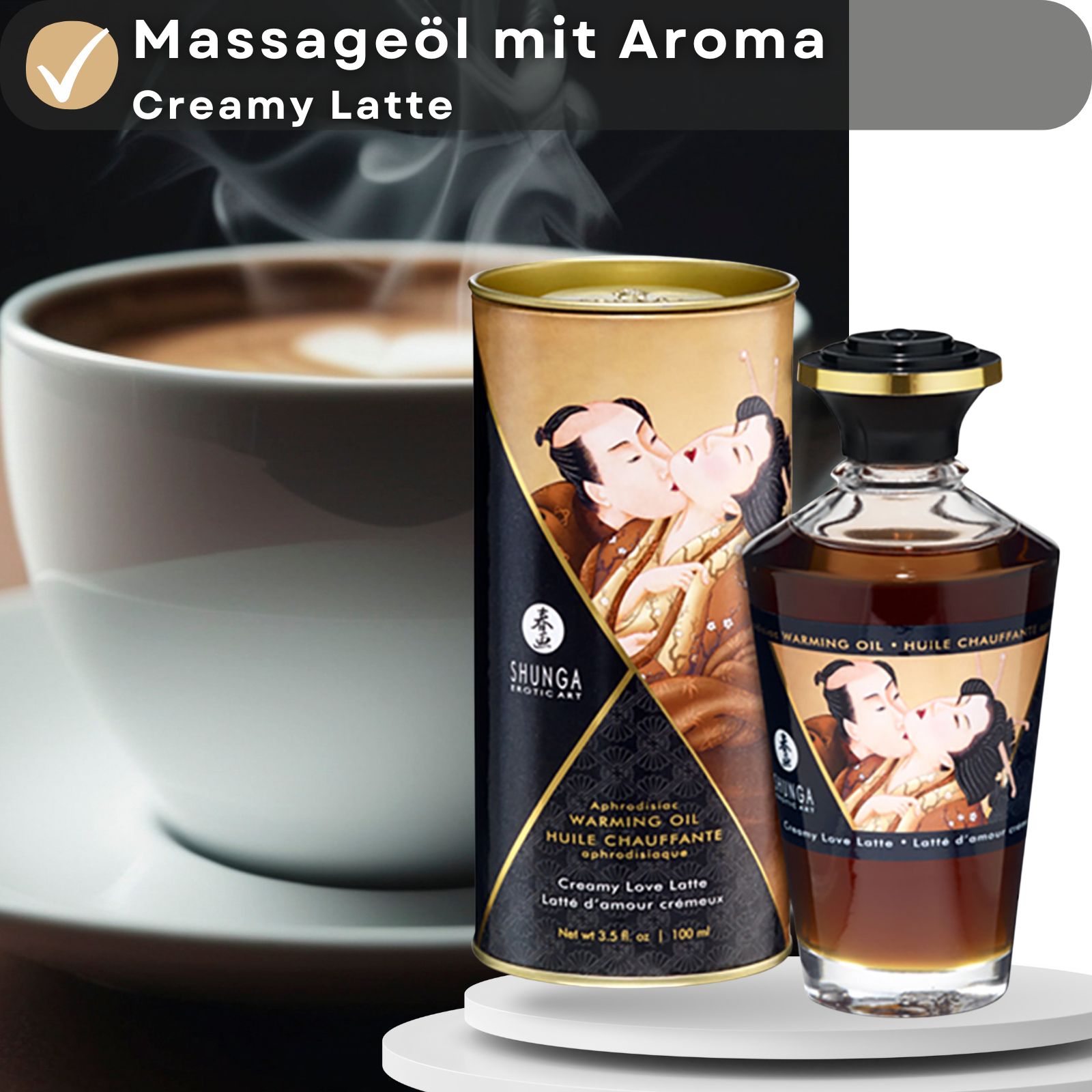 Produkt neben Kaffeetasse. Text: Massageöl mit Aroma Creamy Latte. Flasche und Verpackung mit Aufschrift: SHUNGA, Warming Oil, Creamy Love Latte.