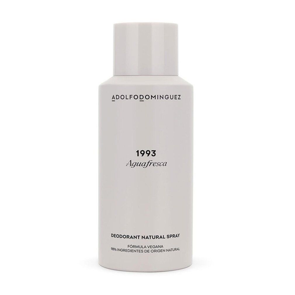 Zylindrische Flasche mit weißem Deckel. Aufschrift ADOLFODOMINGUEZ, 1993, Agua Fresca. Deodorant Natural Spray.
