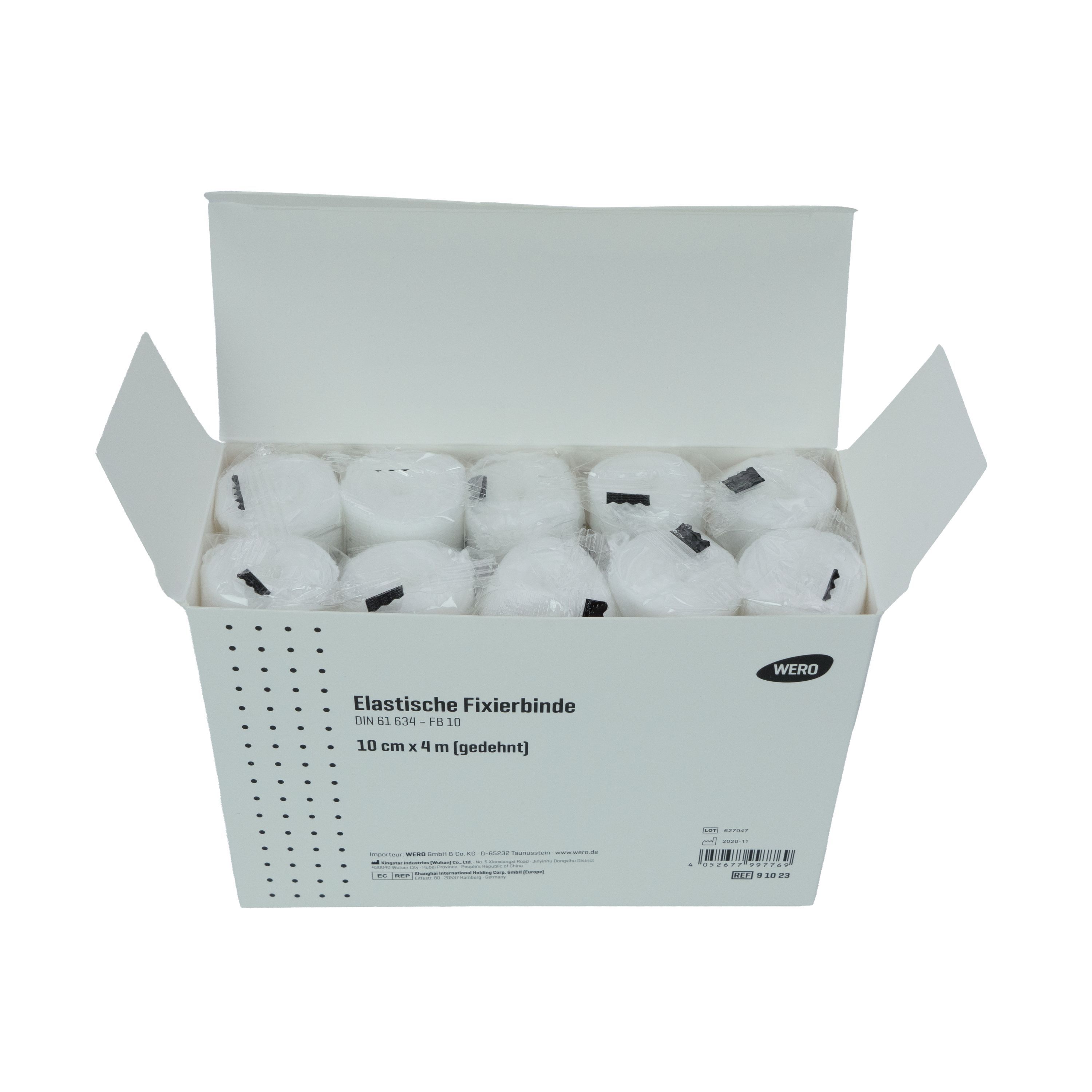 Geöffnete Box mit WERO-Logo und 'Elastische Fixierbinde'. Zehn gerollte, weiße Binden sichtbar. DIN 61 634-FB10. CE-Kennzeichnung.