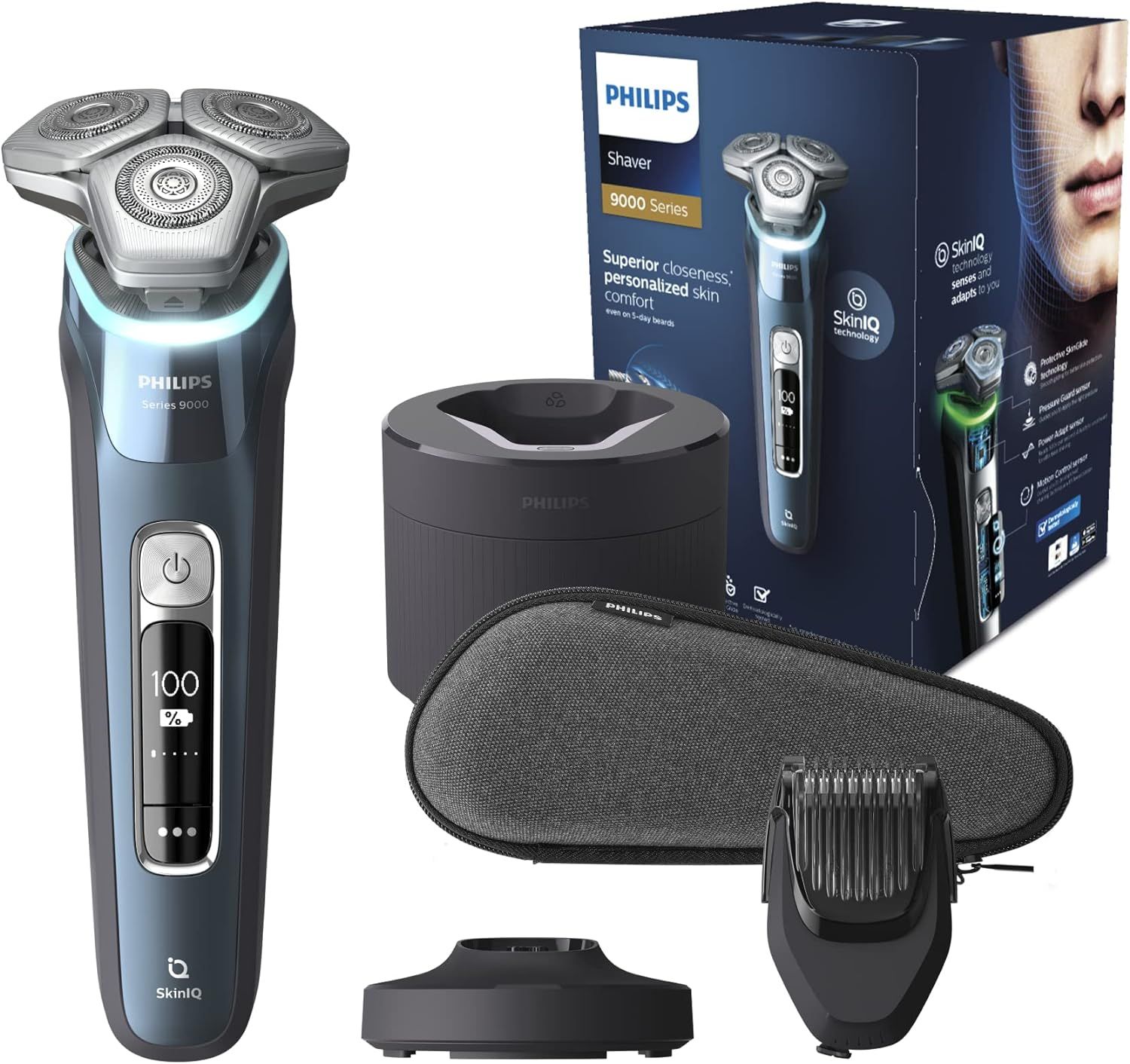 Elektrischer Rasierer mit Zubehör: Ladestation, Etui, Bartstyler-Aufsatz. Verpackung mit Produktabbildung und Schriftzug Philips.