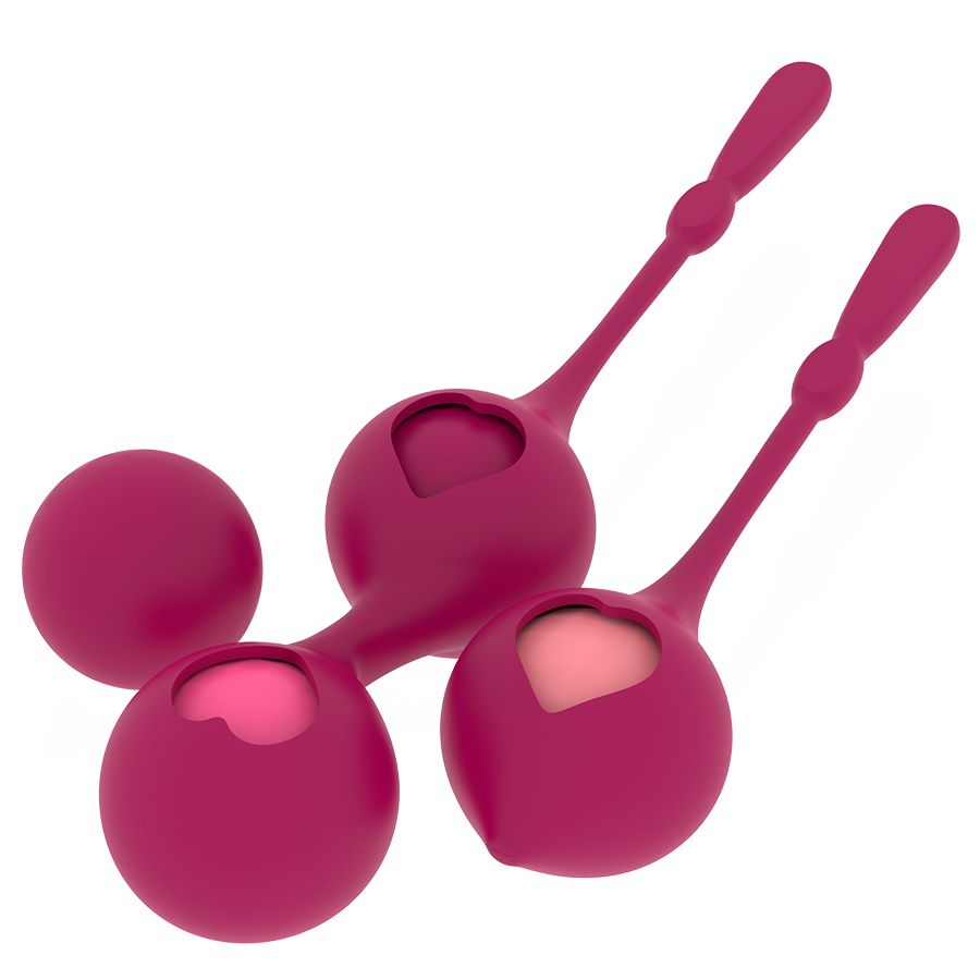 Drei Kegel-Kugeln in Rosa. Zwei Kugeln mit Herzform, eine Kugel rund.