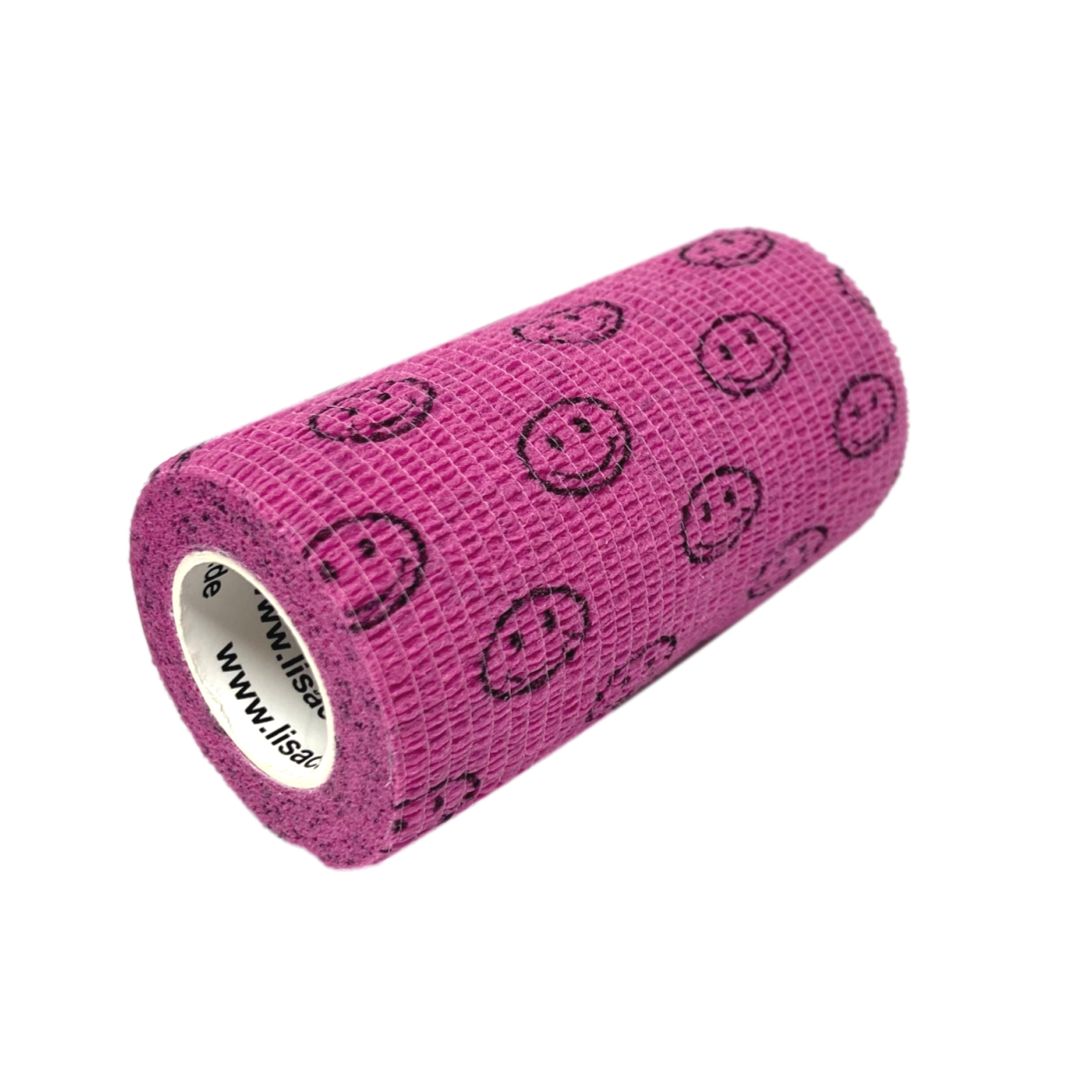 Eine Rolle pinke Kohäsivbandage mit Smiley-Aufdruck.