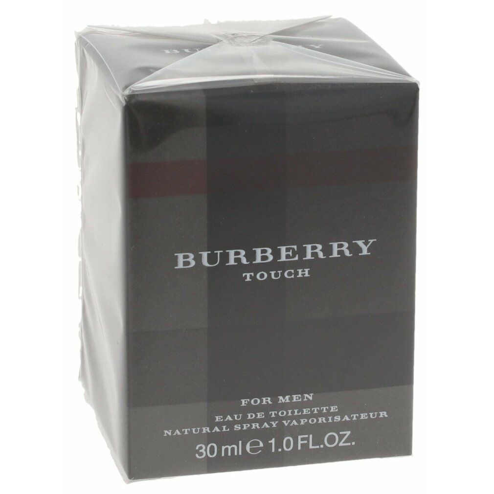Burberry Touch Eau de Toilette Spray-Box. Schwarze Box mit transparentem Kunststoff umhüllt. Aufschrift: Burberry Touch, For Men.