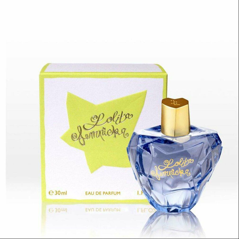 Parfümflakon und Schachtel. Flakon blau, goldener Deckel, goldene Schrift "Lolita Lempicka". Schachtel gelb-weiß.