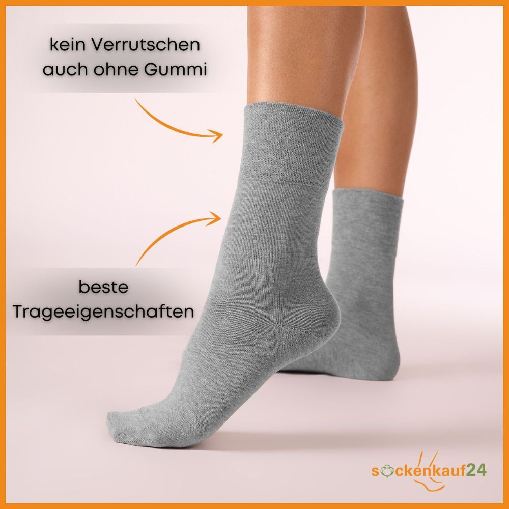 Graue Diabetiker Socken am Bein. Text: Kein Verrutschen auch ohne Gummi, beste Trageeigenschaften.