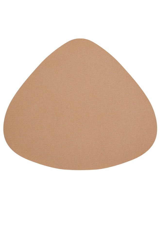 Brustprothese, tropfenförmig, elfenbeinfarben.