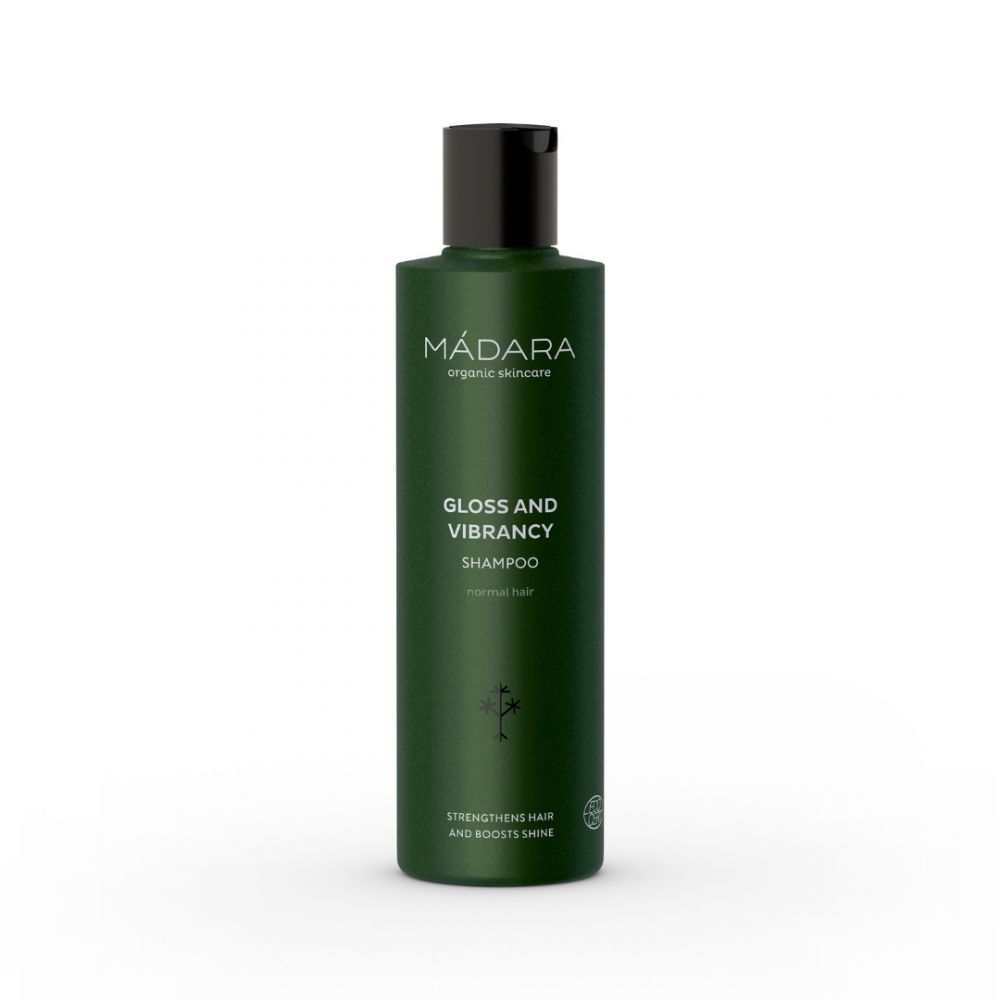 Grüne Shampoo-Flasche mit schwarzem Deckel. Aufschrift: MÁDARA, Gloss and Vibrancy Shampoo, für normales Haar. Mit Logo.