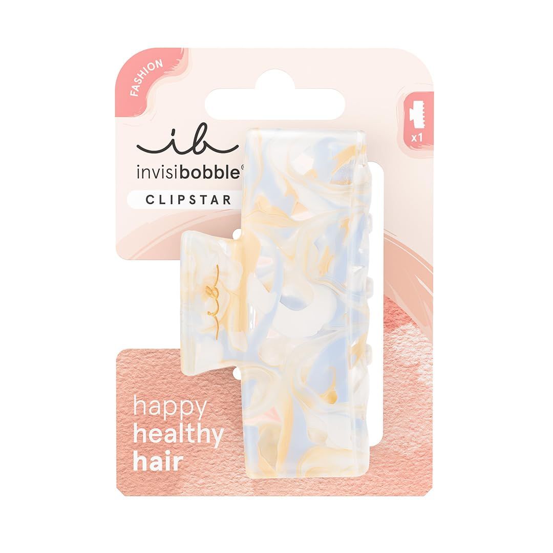 Haarspange mit marmoriertem Muster in Verpackung. Marke: Invisibobble. Text: Clipstar, happy healthy hair. Einzelpackung.