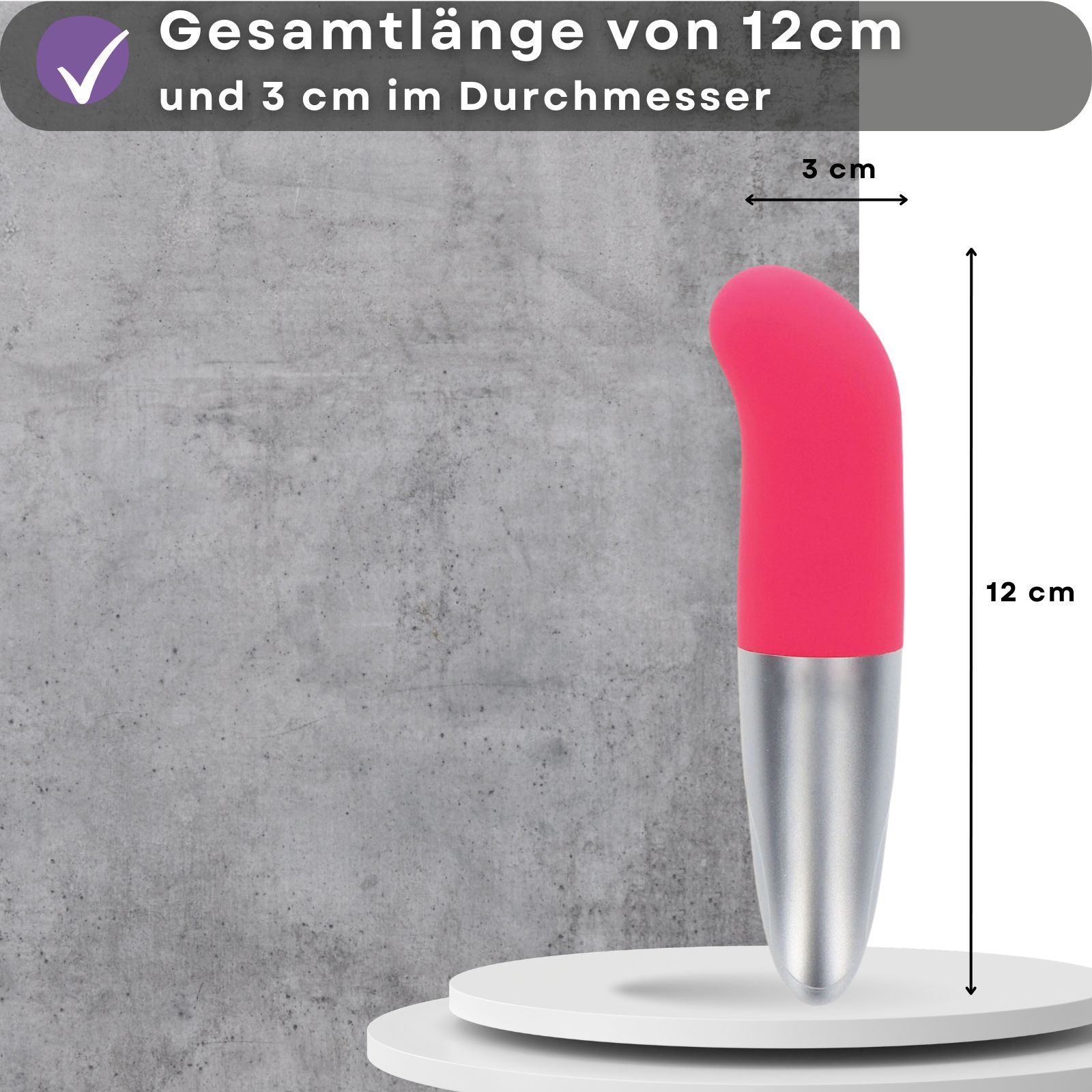 Pinkfarbener Vibrator mit silberfarbenem Schaft. Maße: 12cm lang, 3cm Durchmesser.