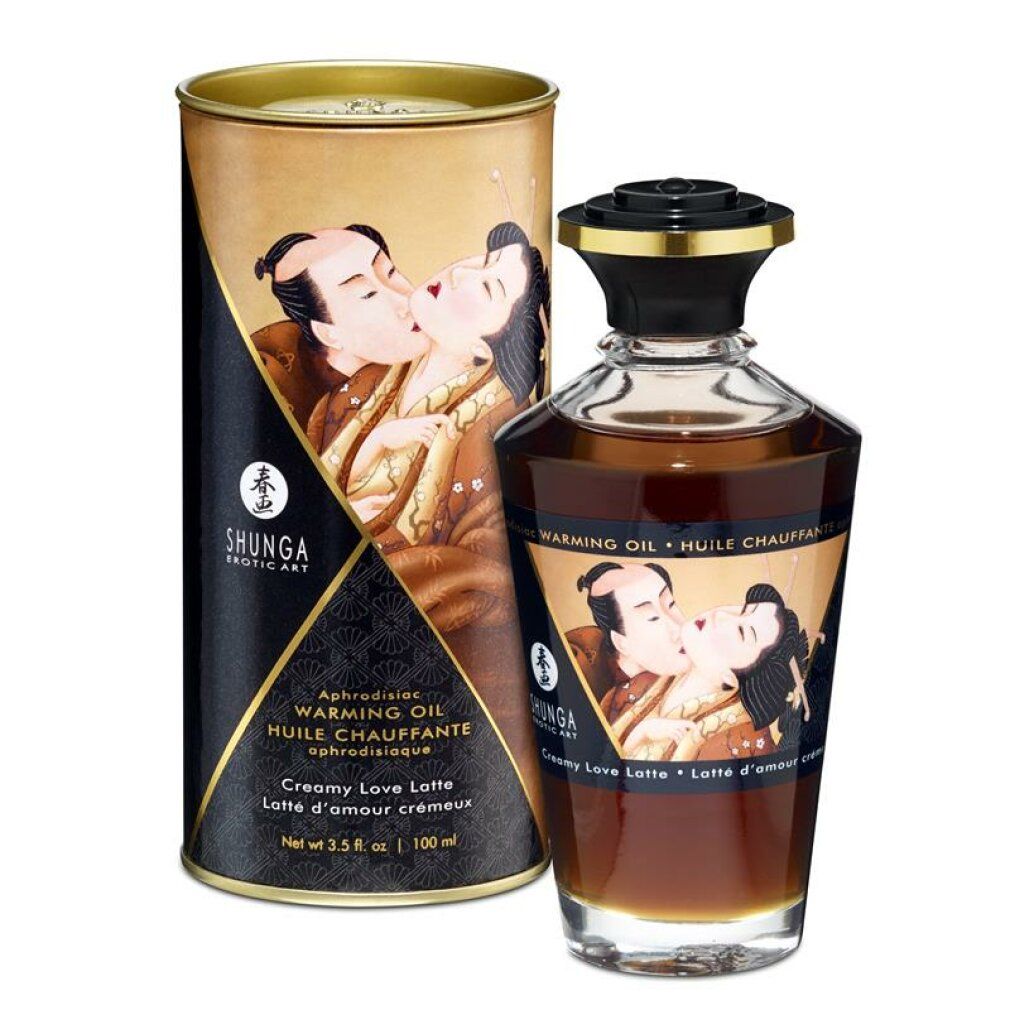Glasflasche und Dose mit Produktabbildung. Aufschrift: Shunga, Warming Oil, Creamy Love Latte. Dose mit schwarzem und goldenem Design.