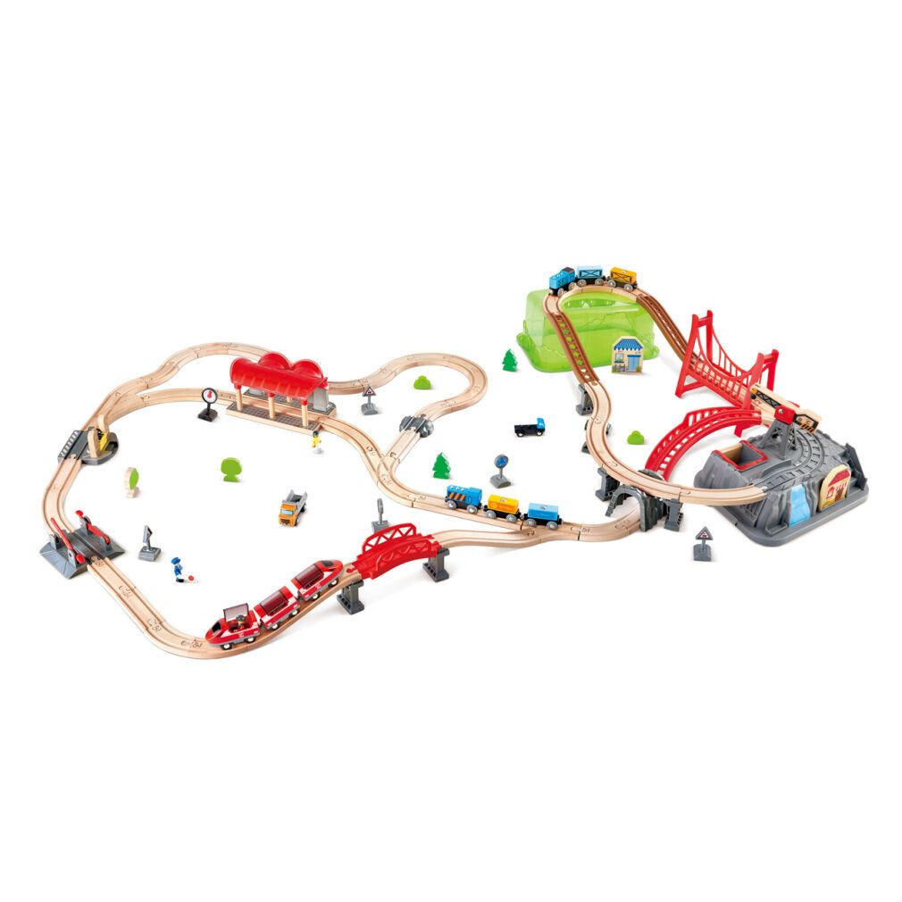 Eisenbahn-Baukasten-Set mit Brücken, Gebäuden und Zügen. Enthält rote und braune Brücken, grüne Hügel und graue Felsen.