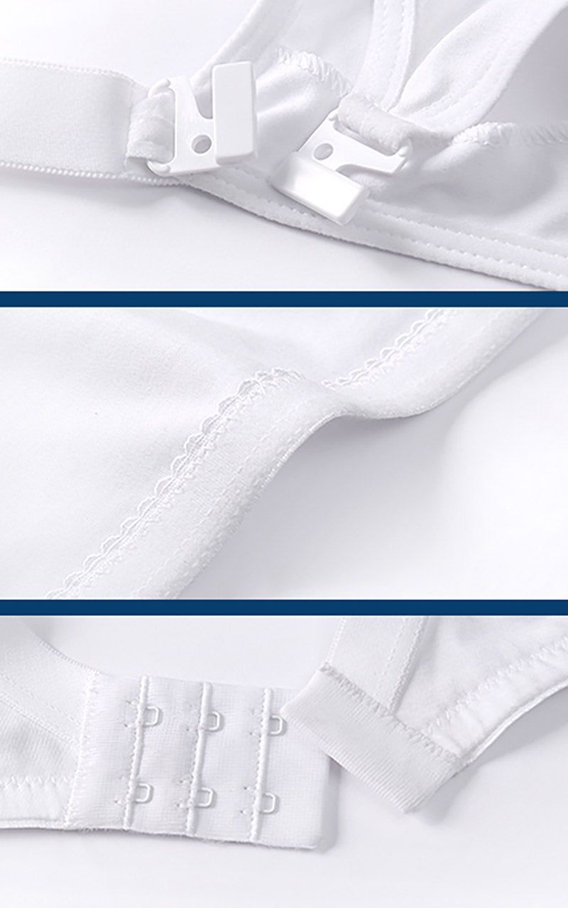 Nahaufnahmen von weißem BH. Zeigt Details der Träger, Nähte und des Verschlusses mit Haken und Ösen.