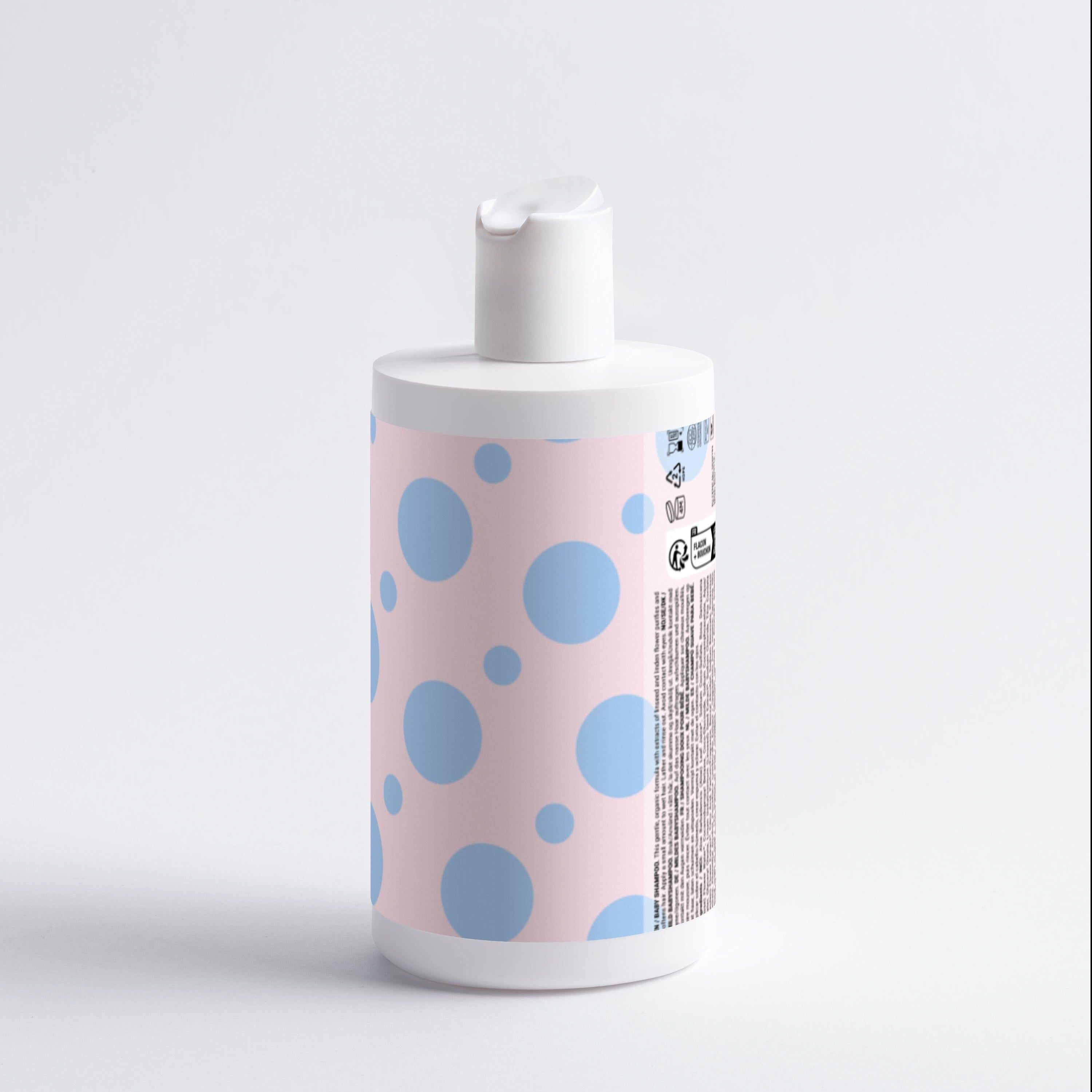 Rückseite einer Zero Skin Sanftes Baby Shampoo Flasche mit rosa und blauen Punkten. Enthält Text.