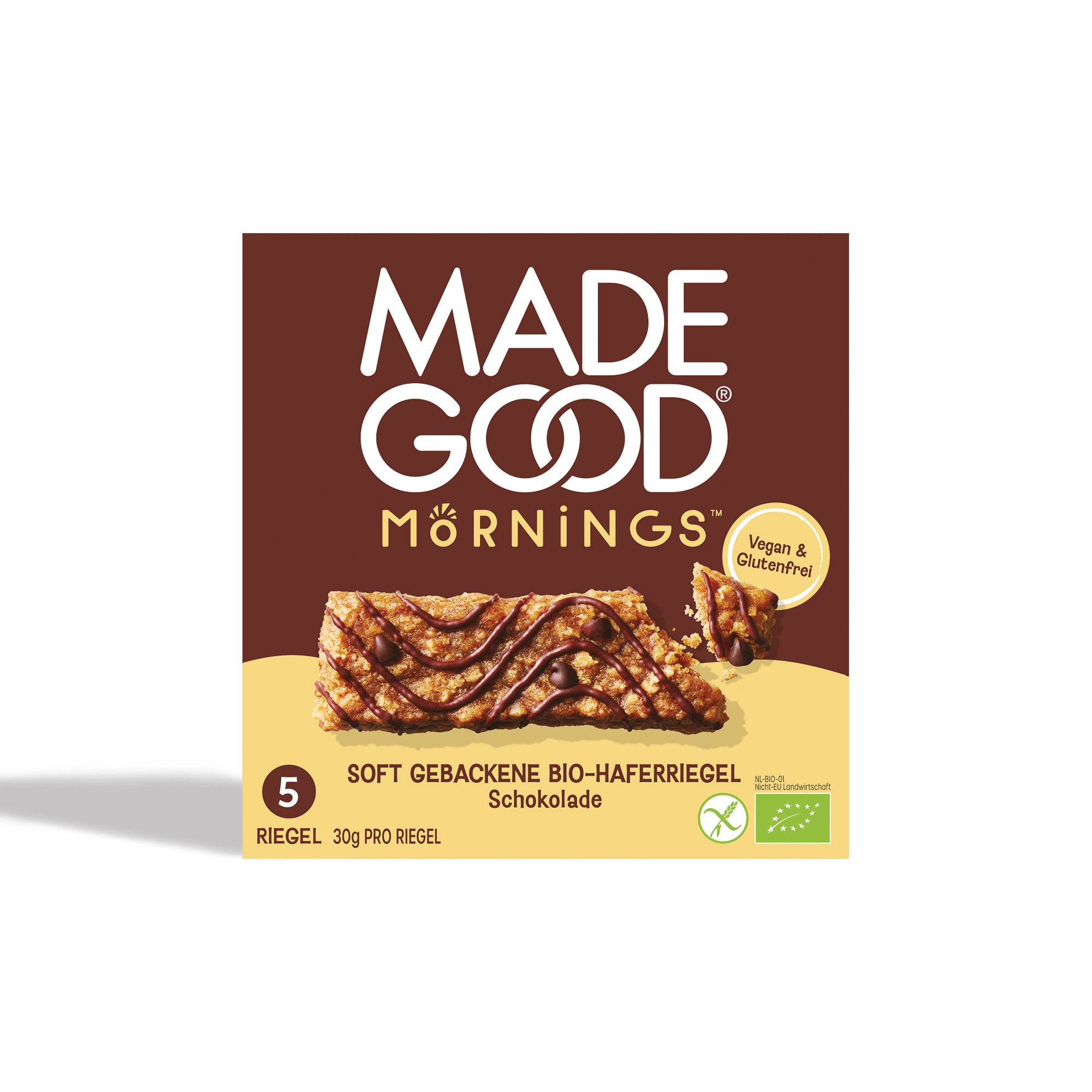 Verpackung von Made Good Mornings Riegeln. Brauner Hintergrund, weißer Schriftzug, Riegel-Abbildung.