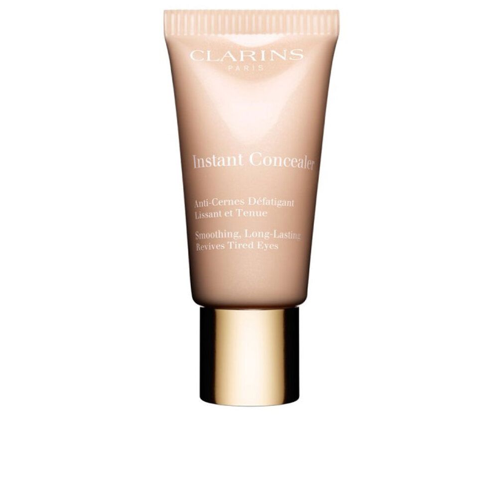 Clarins Instant Concealer Tube. Beige-gelbe Farbnuance. Text auf dem Tube: Instant Concealer, Anti-Cernes Défatigant, Lissant et Tenu.