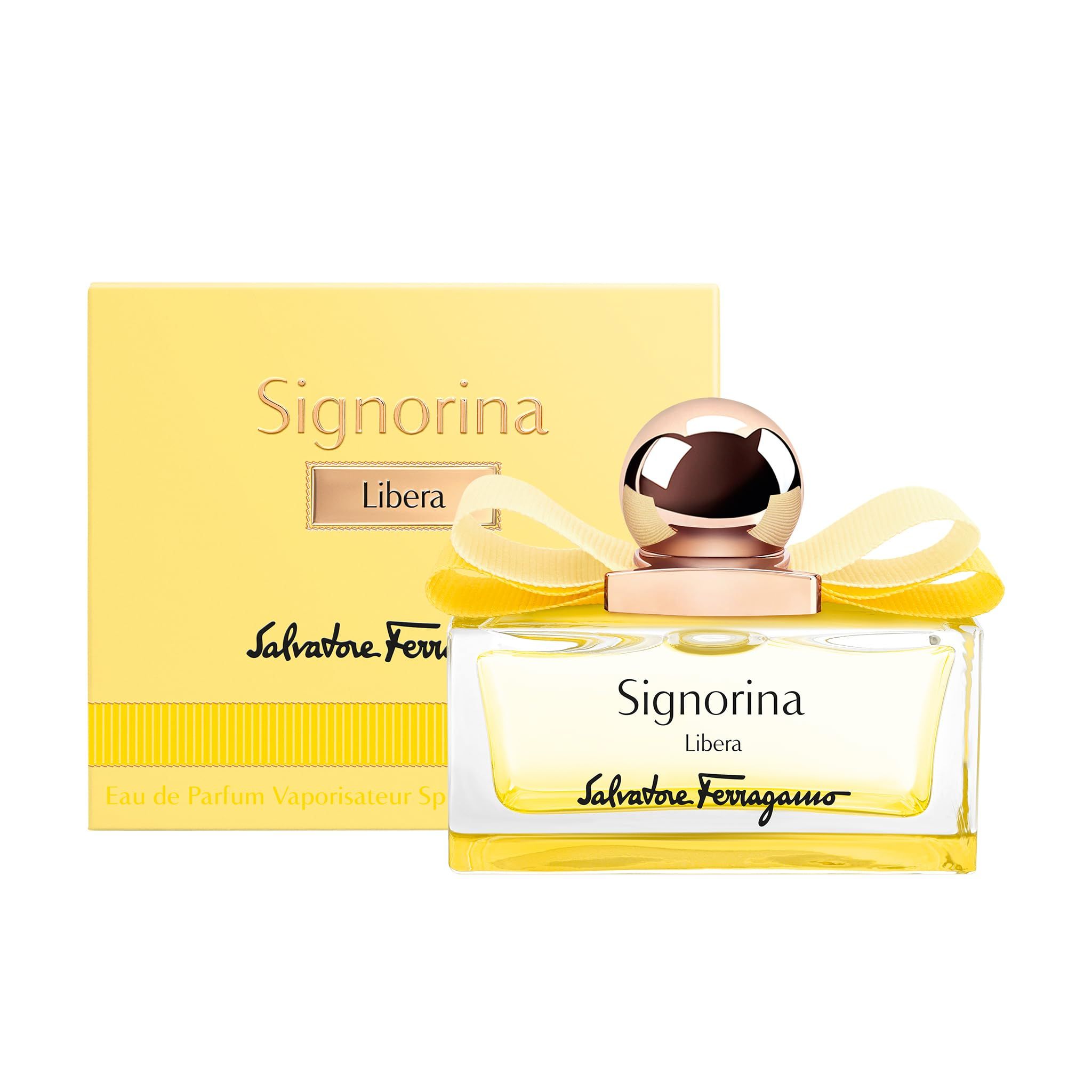 Gelbe Verpackung und Flakon. Flakon mit gelber Flüssigkeit, goldfarbenem Verschluss und gelber Schleife. Schriftzug Signorina Libera.