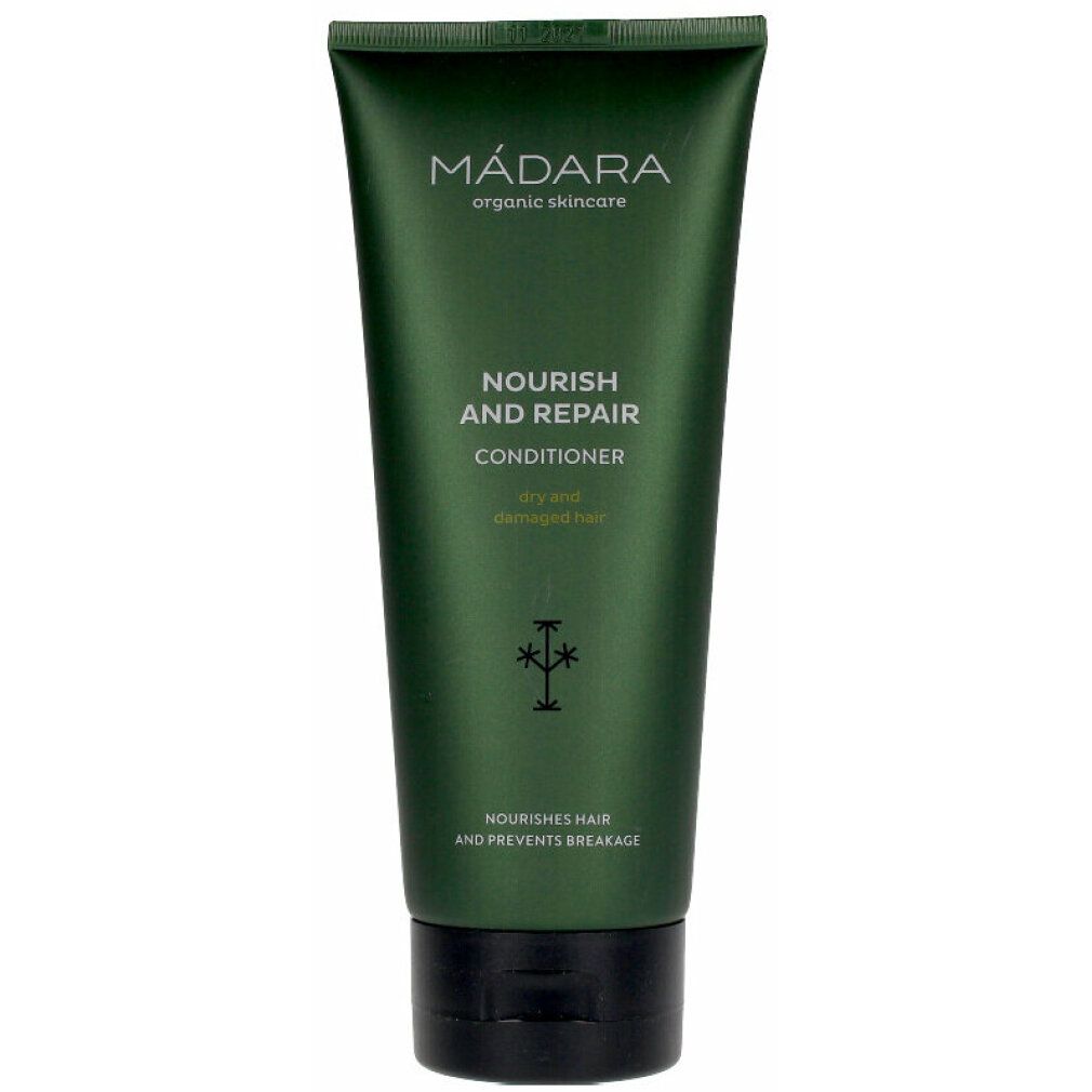 Grüne Tube mit schwarzem Deckel. Aufschrift: MÁDARA, Nourish and Repair Conditioner. Für trockenes, geschädigtes Haar.