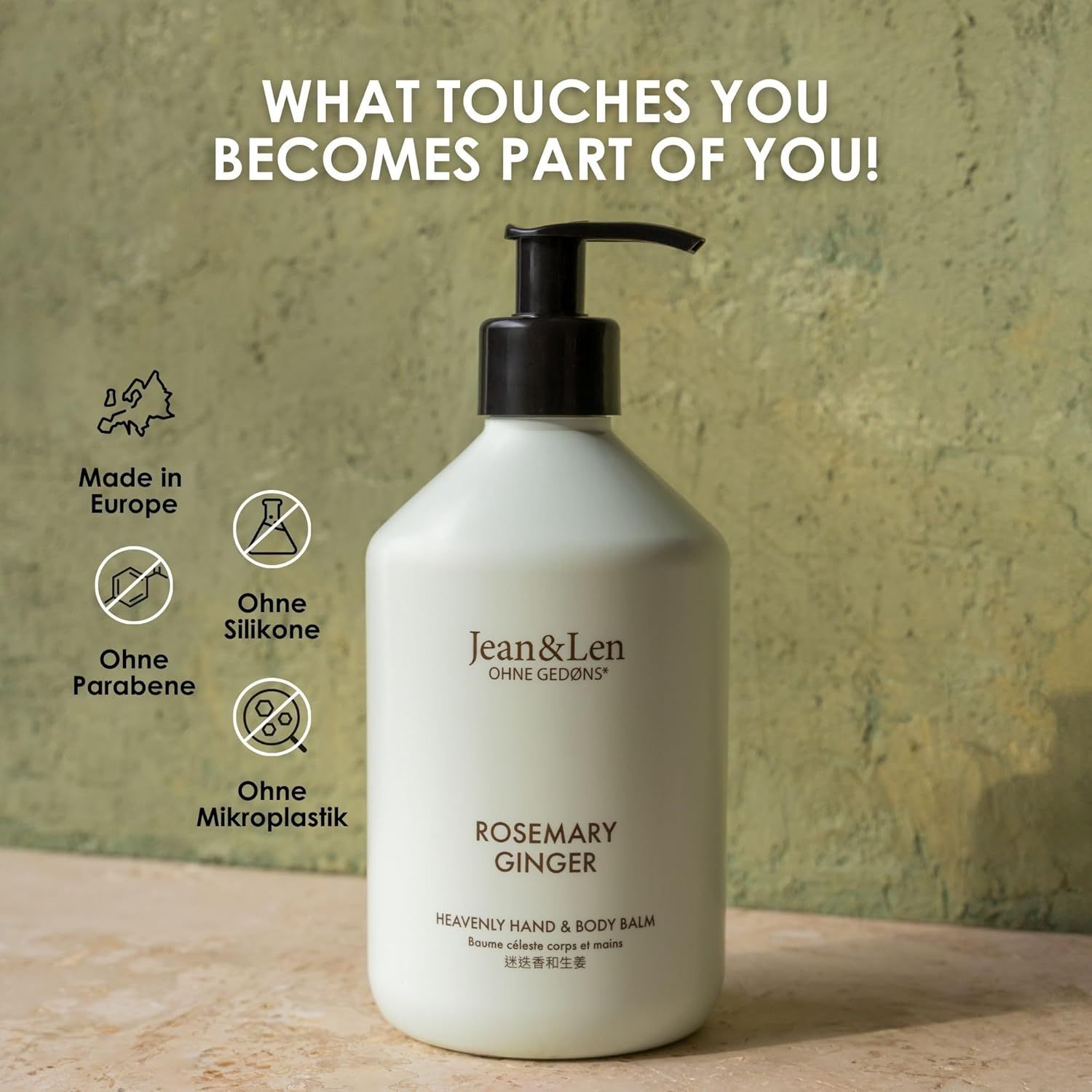 Weiße Flasche mit schwarzem Pumpkopf. Beschriftung: Jean & Len, Rosemary Ginger, Heavenly Hand & Body Balm. Logos: Ohne Silikone, Mikroplastik, Parabene.