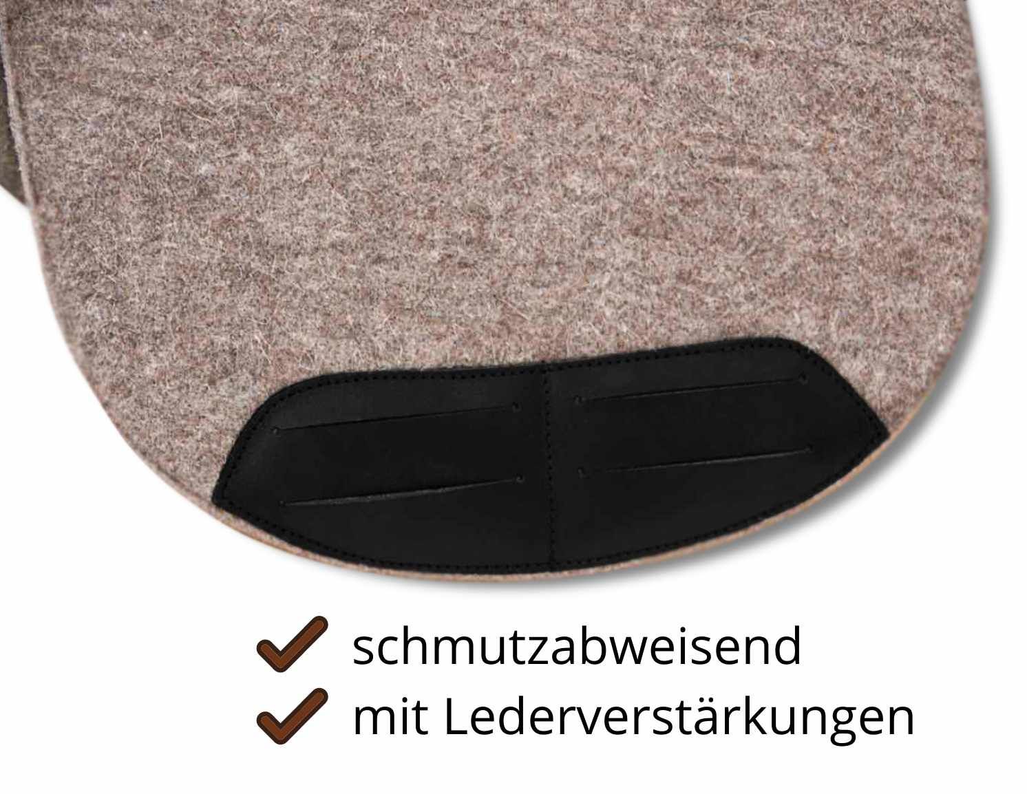 Satteldecke mit Lederverstärkungen und schmutzabweisenden Eigenschaften. Schwarze Lederdetails.
