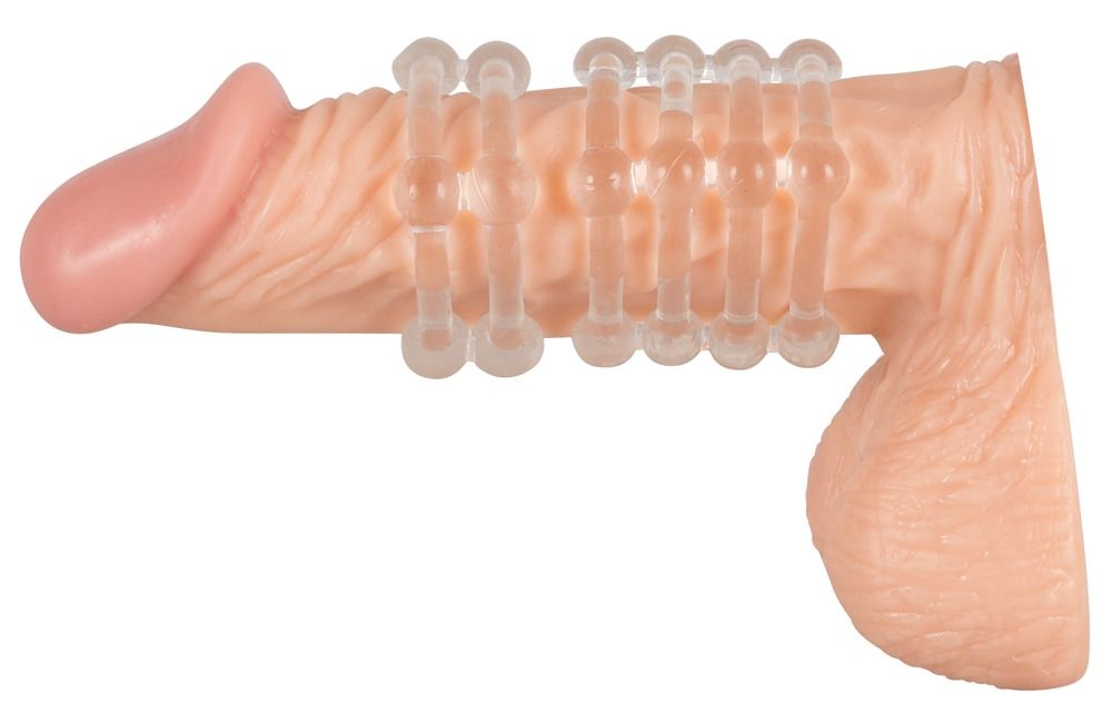 Ein Penis mit transparenten Ringen. Mehrere Ringe am Schaft, einer am Hodensack.