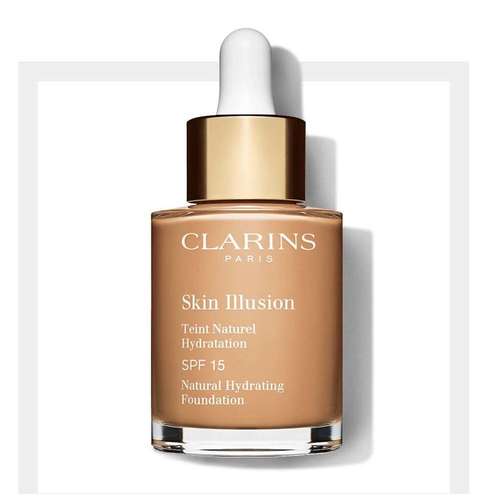 Flüssige Foundation in Glasflasche mit Pipette. Aufschrift: Clarins, Skin Illusion, Teint Naturel Hydratation, SPF 15, Natural Hydrating Foundation.
