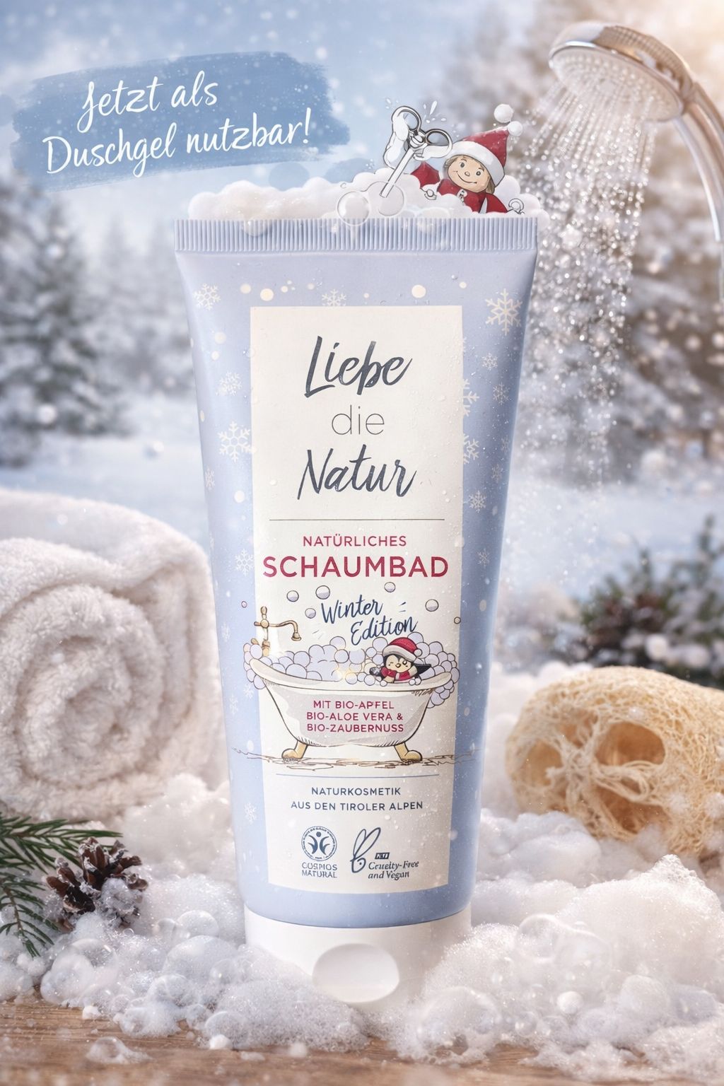 Blau-weiße Tube mit "Liebe die Natur" und "Natürliches Schaumbad Winter Edition". Pinguin in Badewanne. Schnee- und Winterdekoration. Logos: Cosmos Natural, Cruelty-Free.