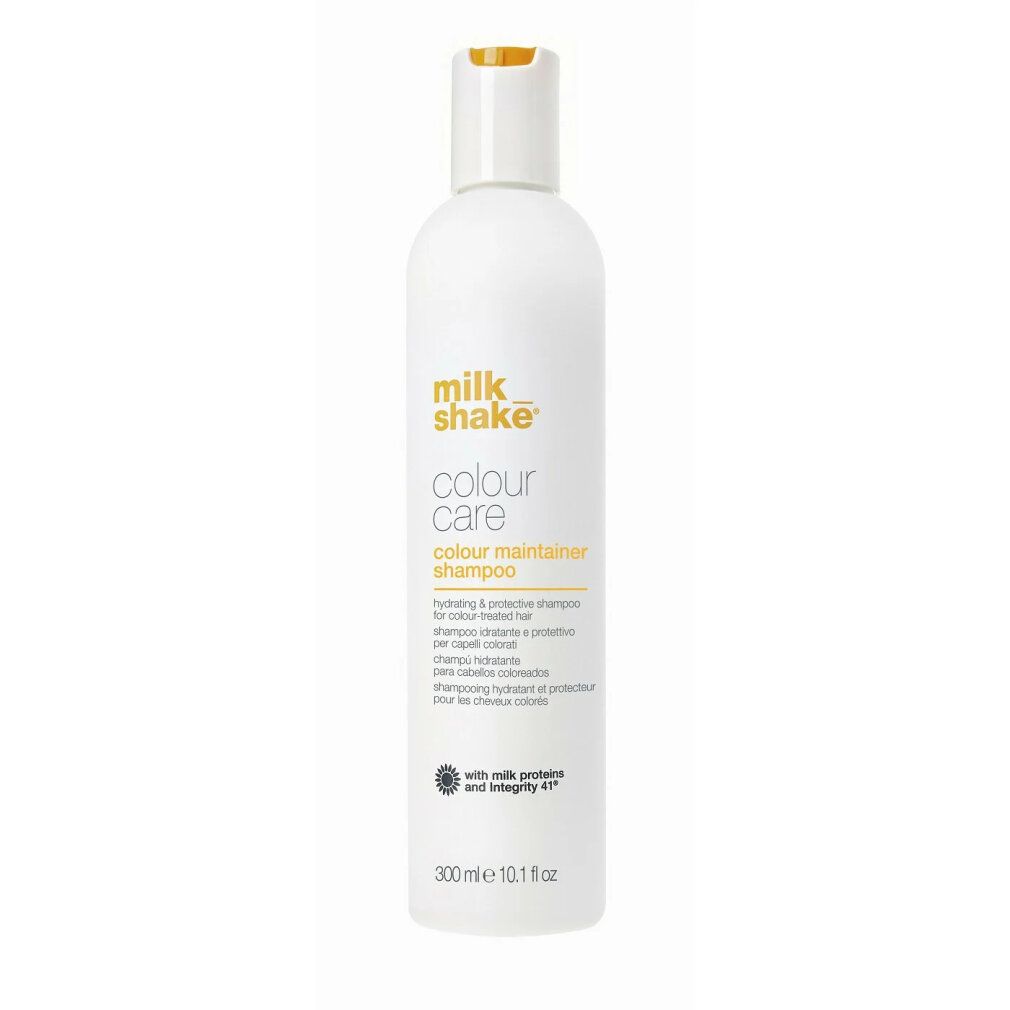 Weiße Flasche mit gelbem Verschluss. Aufschrift: milk_shake, colour care, colour maintainer shampoo. Text in mehreren Sprachen.