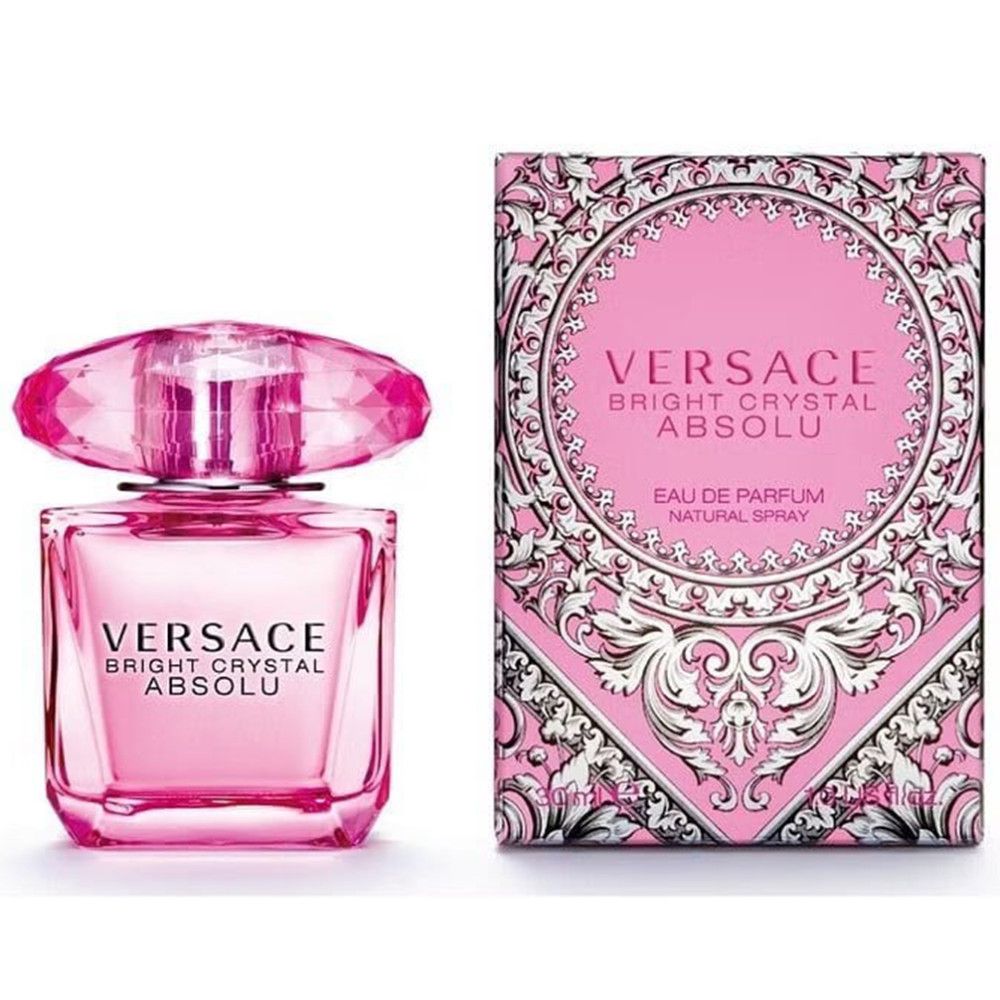 Rosa Flakon und Verpackung. Aufschrift: Versace Bright Crystal Absolu Eau de Parfum Spray. Verpackung mit Muster.